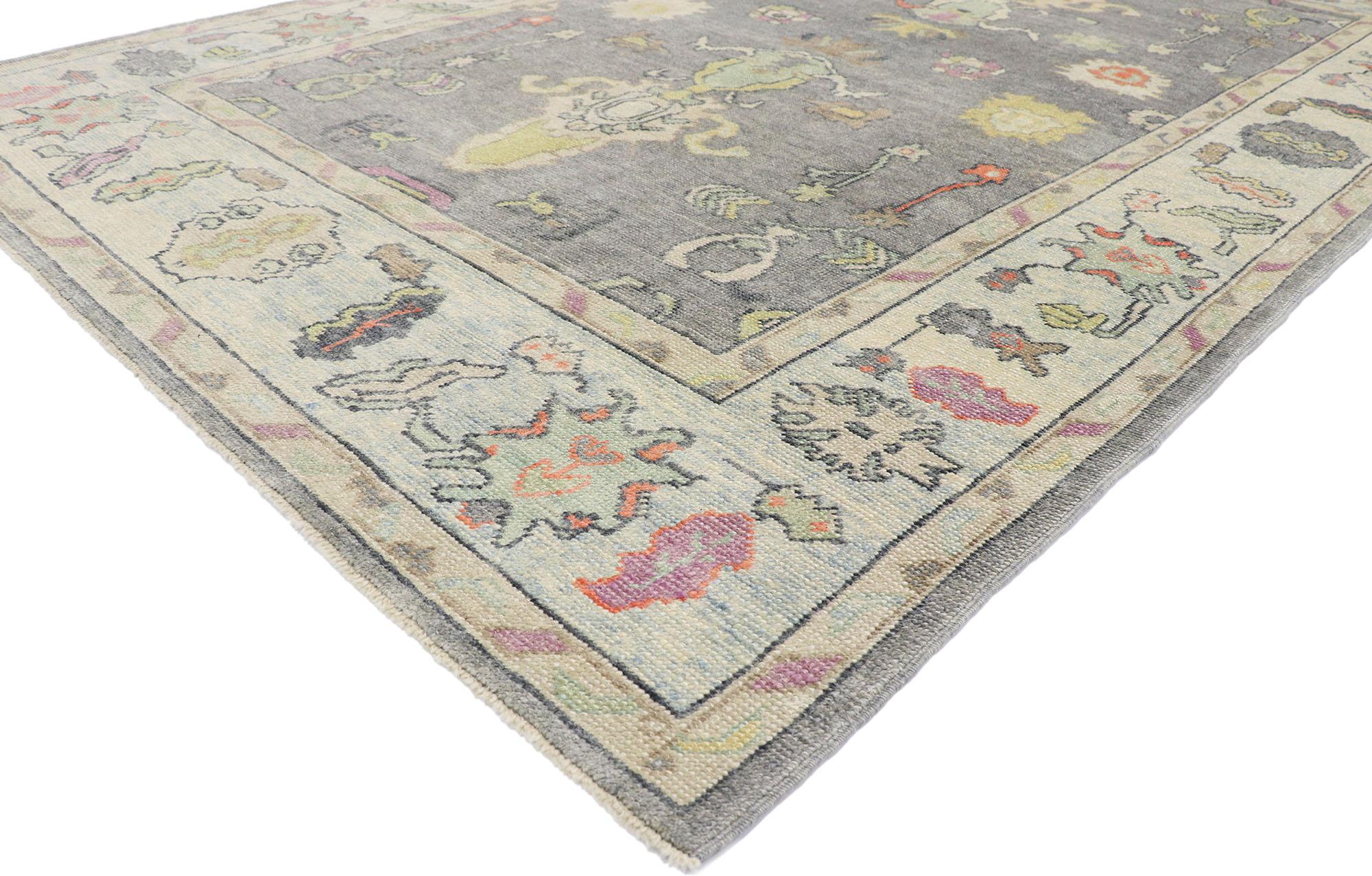 53555 new contemporary Turkish Oushak rug with Modern Parisian style 06'11 x 10'08. Polished and playful, this hand-knotted wool Turkish Oushak rug beautifully embodies a modern Parisian style. The dominant gray field features a colorful array of