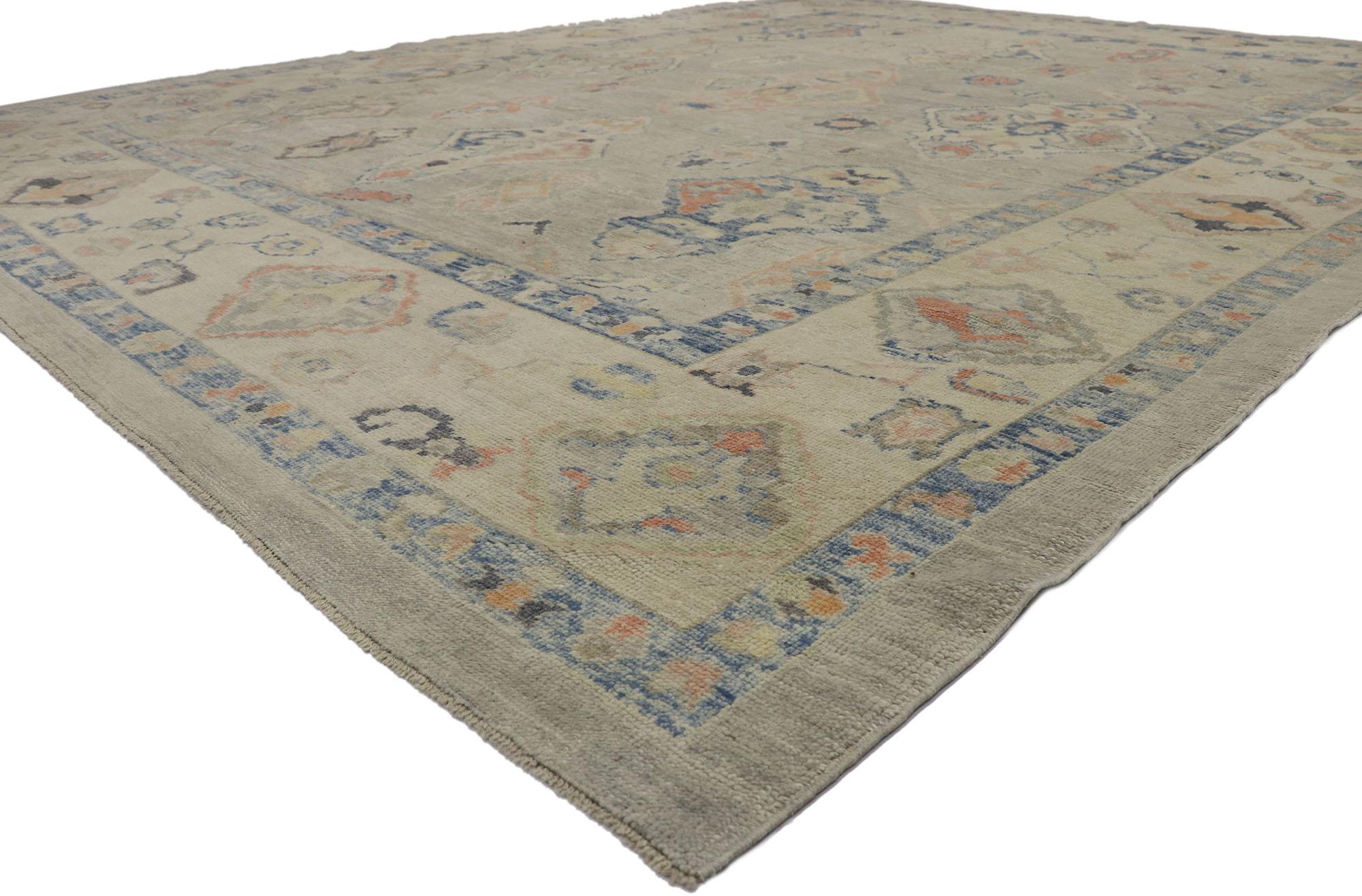 53608 New Modern Turkish Oushak Rug, 11'09 x 15'00. Exuding both refinement and whimsy, this hand-knotted wool Turkish Oushak rug is a captivating embodiment of modern elegance. Its abrashed gray field serves as a sophisticated backdrop for an array