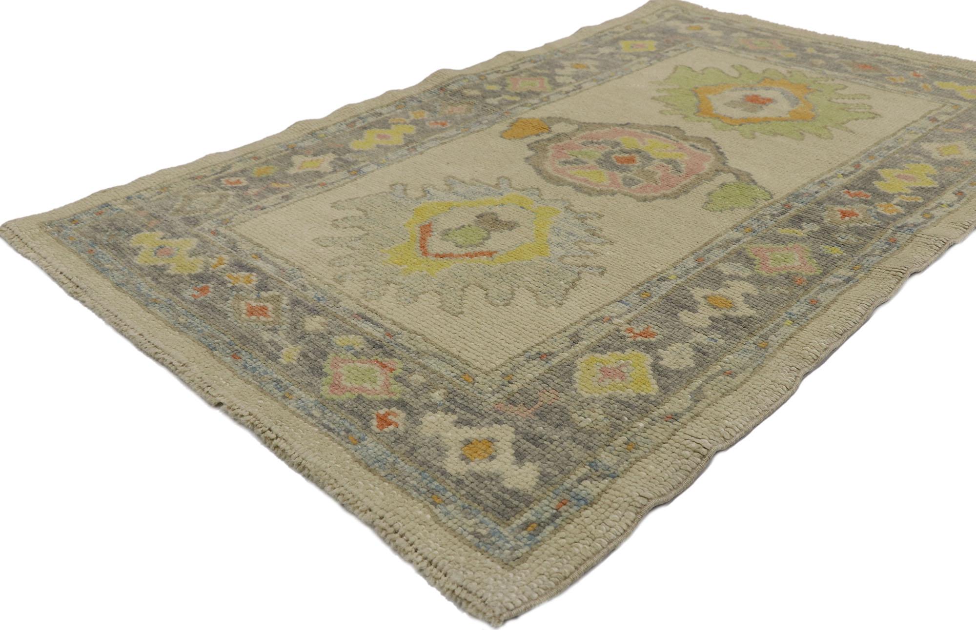 53595 new contemporary Turkish Oushak rug with Modern style 03'00 x 04'10. Polished and playful, this hand-knotted wool small Turkish Oushak rug beautifully embodies a modern style. The abrashed oatmeal colored field features three colorful
