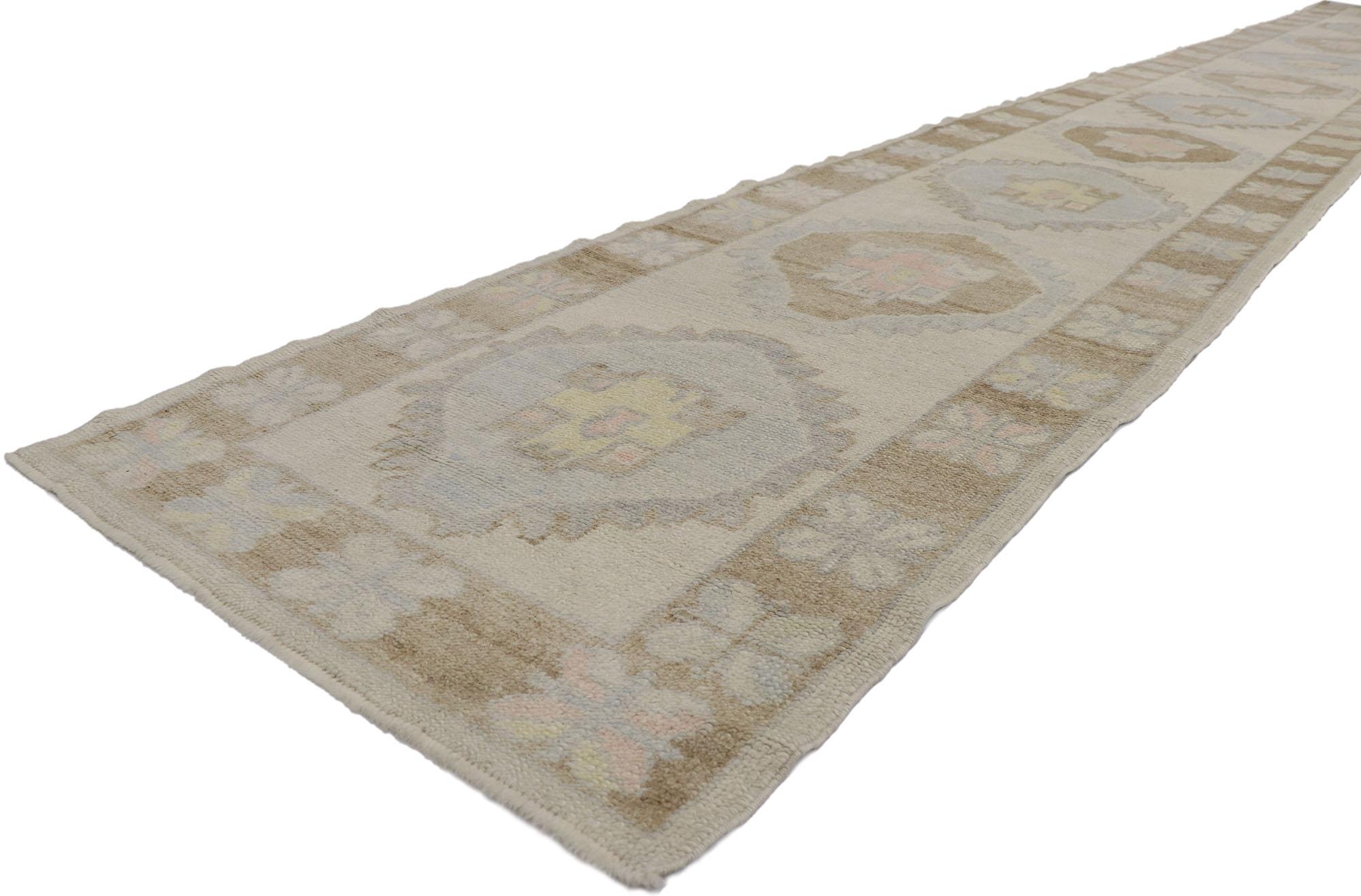 53588 New Contemporary Turkish Oushak Runner with Modern Style 03'00 x 21'05. This hand-knotted wool contemporary Turkish Oushak runner features an all-over geometric pattern spread across an abrashed gray striated field. An array of tribal motifs