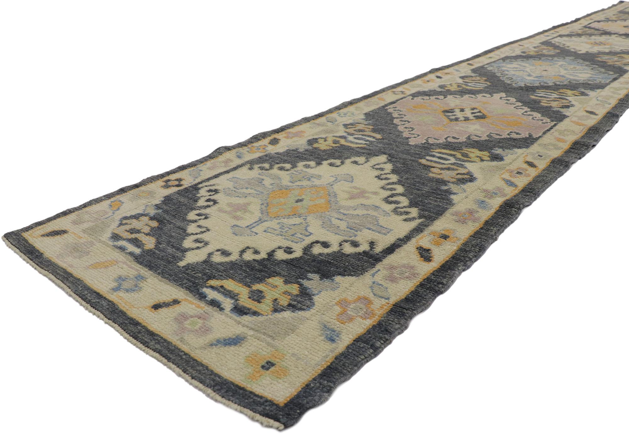 53586 New Contemporary Turkish Oushak Runner with Modern Style 02'11 x 18'02. This hand-knotted wool contemporary Turkish Oushak runner features an all-over geometric design spread across an abrashed charcoal and navy blue striated field. An array