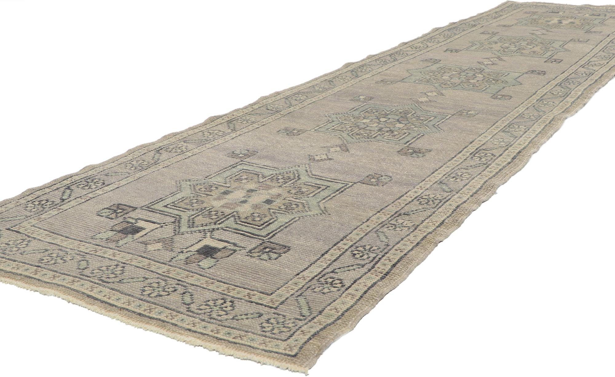 53794 new contemporary Turkish Oushak Runner with Modern style, 02'08 x 11'02. This hand-knotted wool contemporary Turkish Oushak runner features a botanical pattern spread across an abrashed bluish-grayish field. An array of botanical motifs