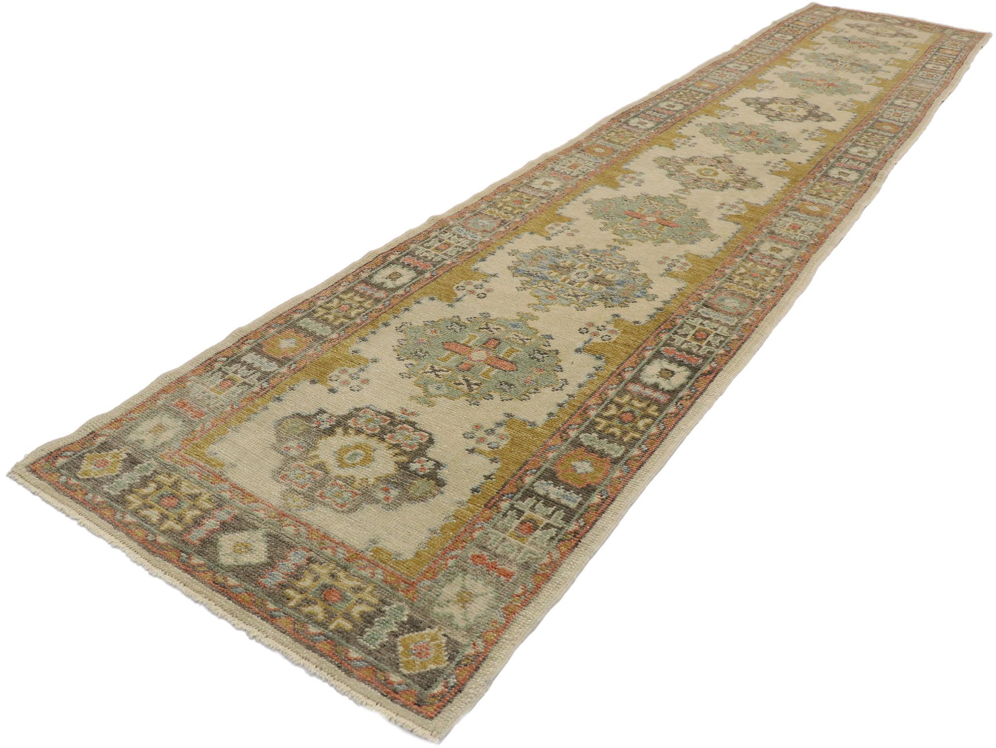 53378, new contemporary Turkish Oushak Runner with Transitional Modern style. Displaying architectural elements of naturalistic forms in warm earth-tone colors with decorative elegance, this hand knotted wool contemporary Turkish Oushak runner