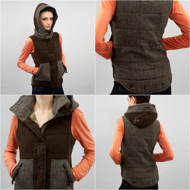 Da-Nang Wool Vest
Brand New w/ Tags
* Removable Hood
* Zipper and Button Closure
* Side Pockets & Zippered Compartments 
* Fabric Front: 50% Wool 50% Poly
* Fabric Back: 30% Wool, 40% Poly, 30% Acrylic