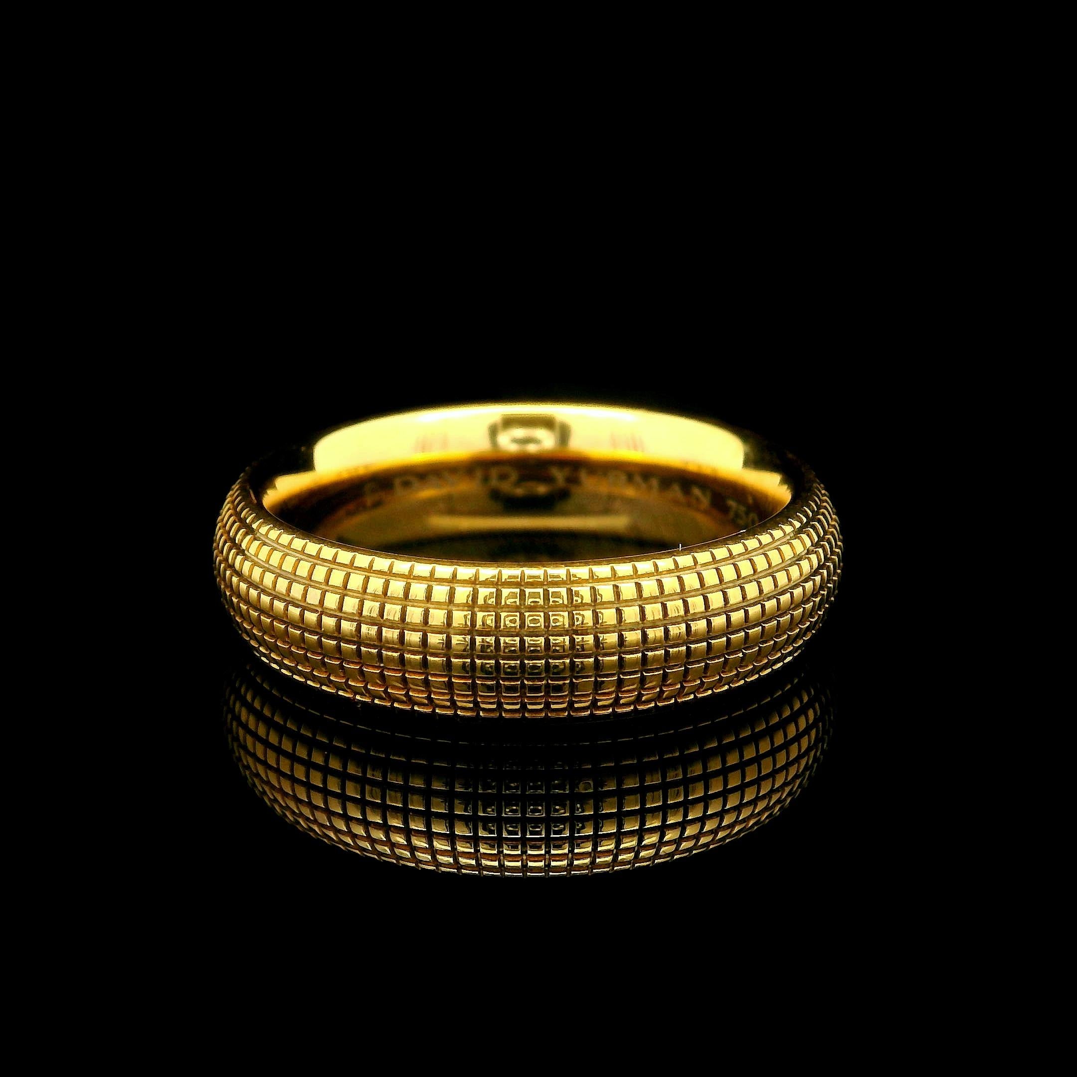 Material: Solid 18K Yellow Gold
Weight: 11.68 Grams
Ring Size: 9.5 (We CANNOT custom size this ring.)
Ring Width: 5.9mm
Ring Height: 2.8mm rise off the finger
Stamp: ©David Yurman - 750
Condition: New!
Stock Number: MK-78078153
Retail Price is $3250