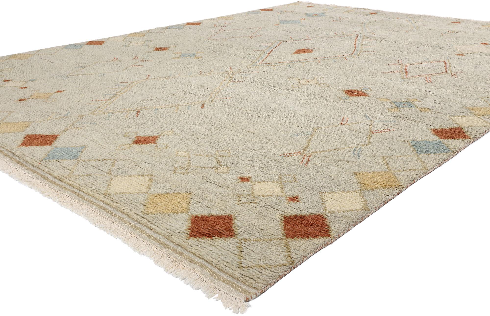 31268 New Desert Breeze Modern Moroccan Rug, 09'02 x 12'01. This hand knotted wool Desert Breeze Modern Moroccan Rug is a captivating piece that effortlessly blends traditional Moroccan design with contemporary aesthetics. This Moroccan area rug