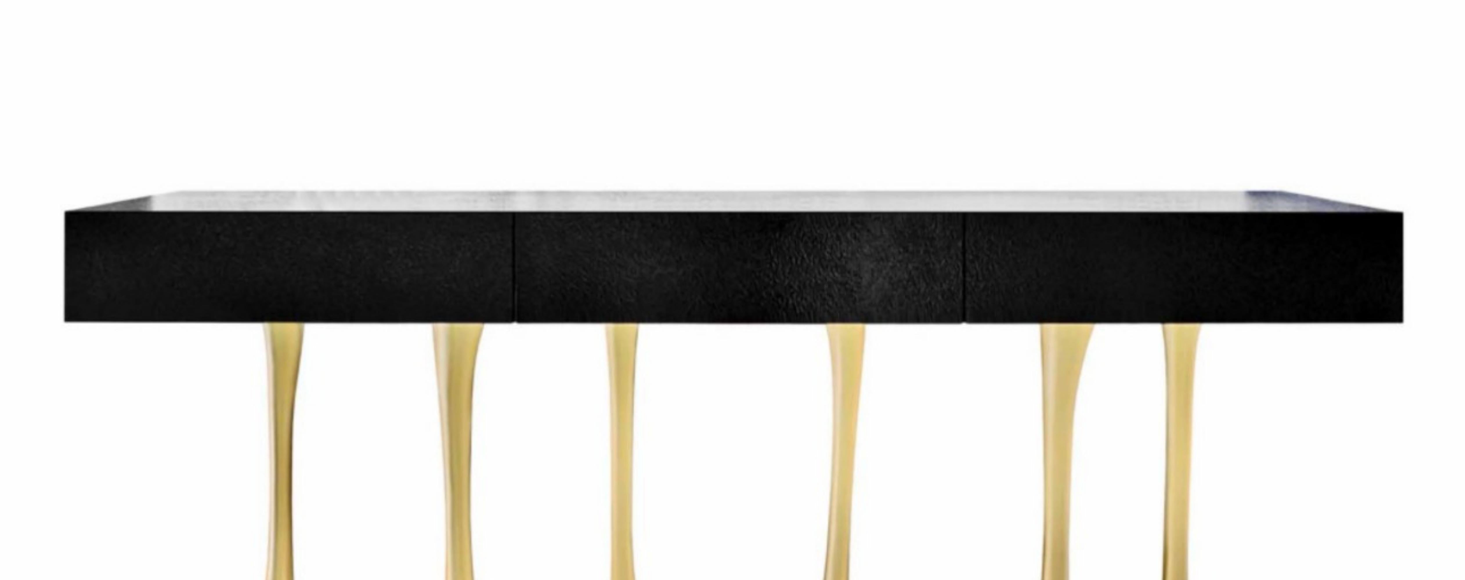 Console

General Information

Dimensions (cm): 210 x 45 x 90


Materials and Colors

Structure: Wood reinforced with fiberglass, textured and finished in black high gloss;
Base: Resin reinforced with fiberglass, finished in gold color.

