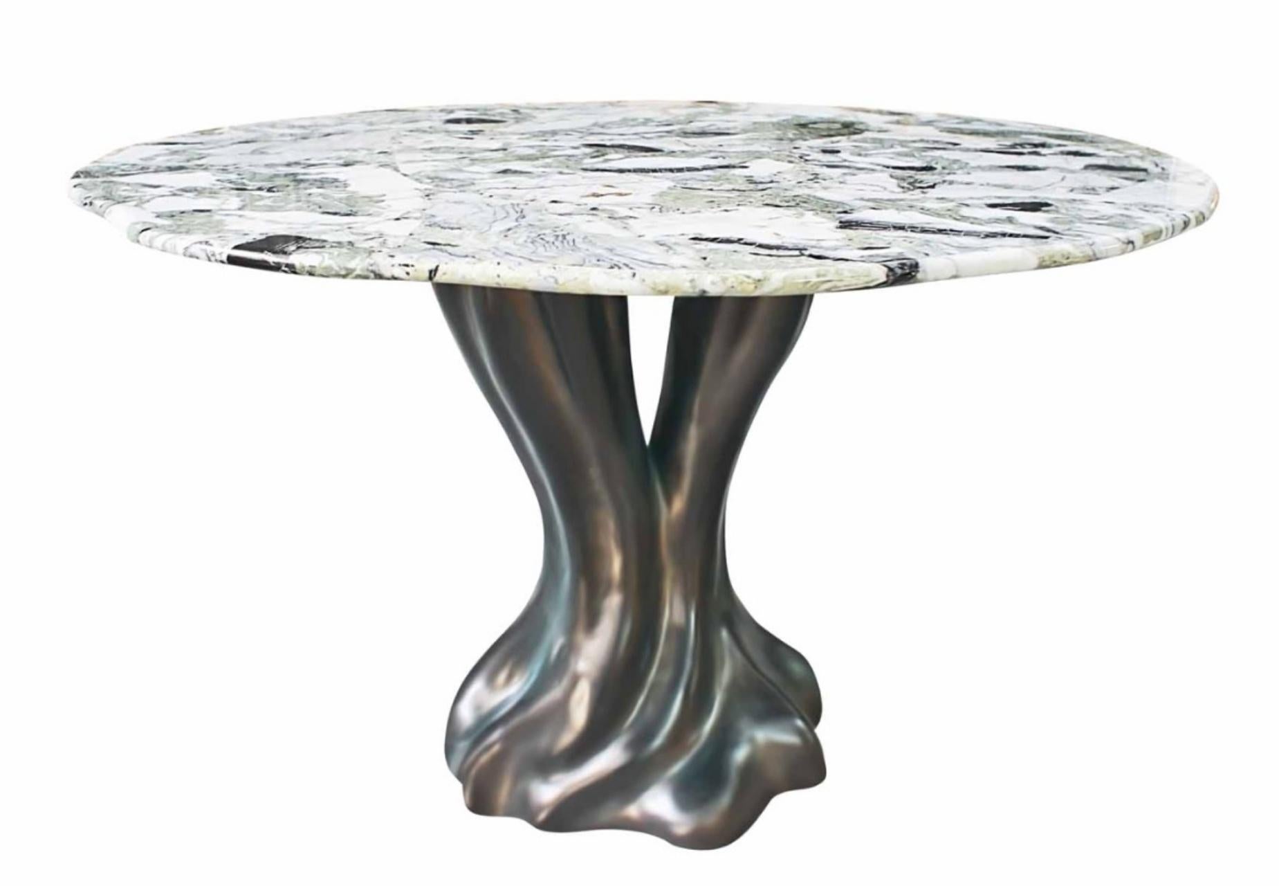 Dining table

General information

Dimensions (cm): Ø120 x 75
Dimensions (in): Ø47.2 x 29.5
seats: 4 a 6

Materials and Colors

Top: ice jade marble;
Base: resin reinforced with fiberglass finished in bronze color.



