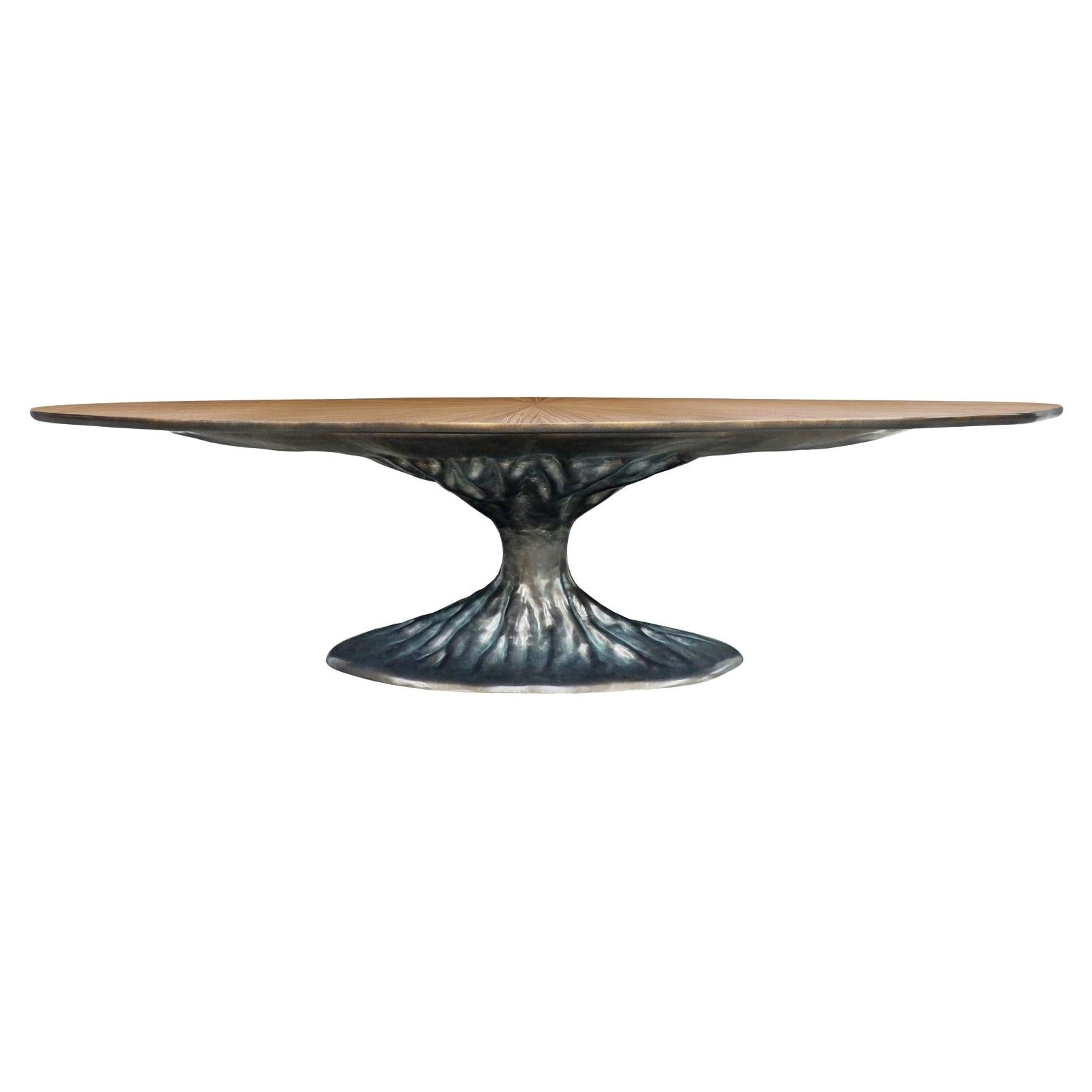 Dining Table with Walnut Veneer and a Brass Foot at 1stDibs