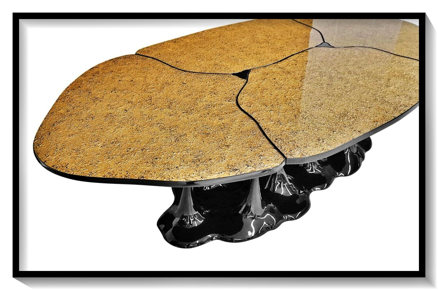 Dining table.

General Information
Dimensions (cm): 250 x 130 x 75.
Dimensions (in): 98.4 x 51.2 x 29.5.
Seats: 8 a 10.

Materials and Colors
Top: Textured gold leaf finish covered by clear resin;
Base: Resin reinforced with fiberglass, lacquered in