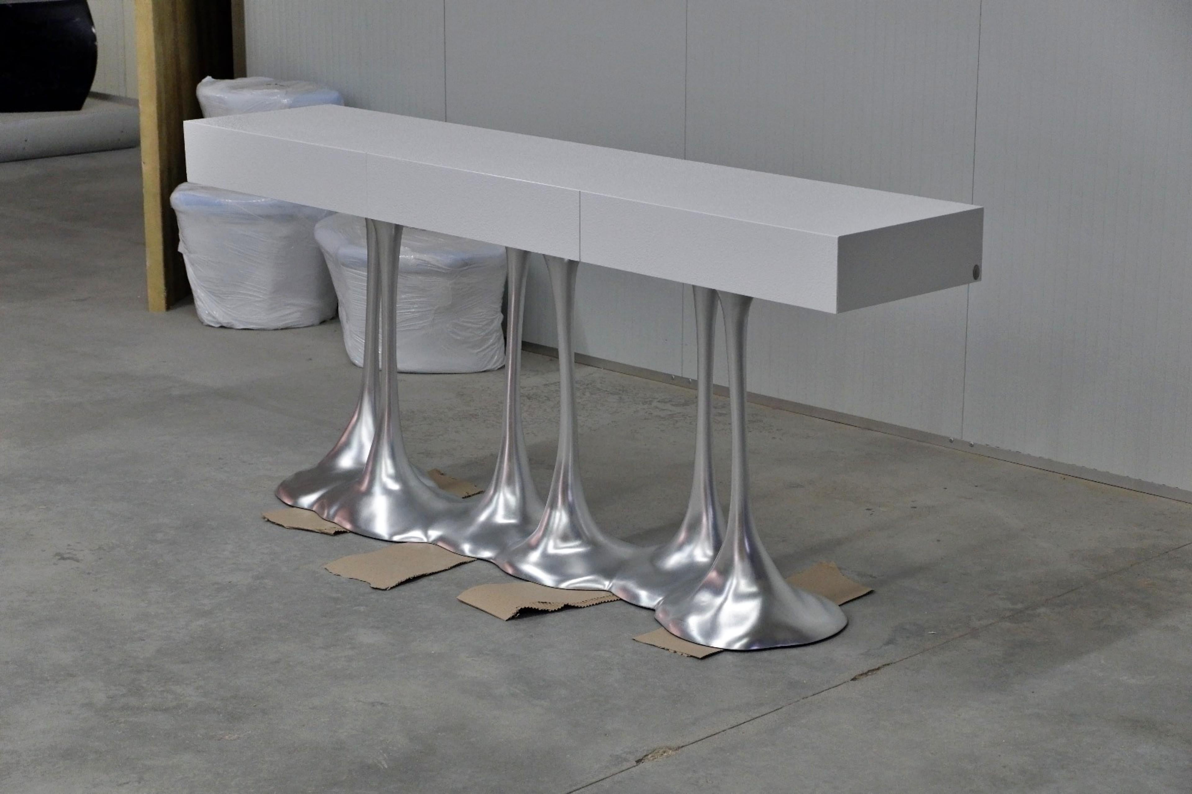 Console

General Information

Dimensions (cm): 210 x 45 x 90


Materials and Colors

Structure: Wood reinforced with fiberglass, textured and finished in white high gloss;
Base: Resin reinforced with fiberglass, finished in chrome color.

