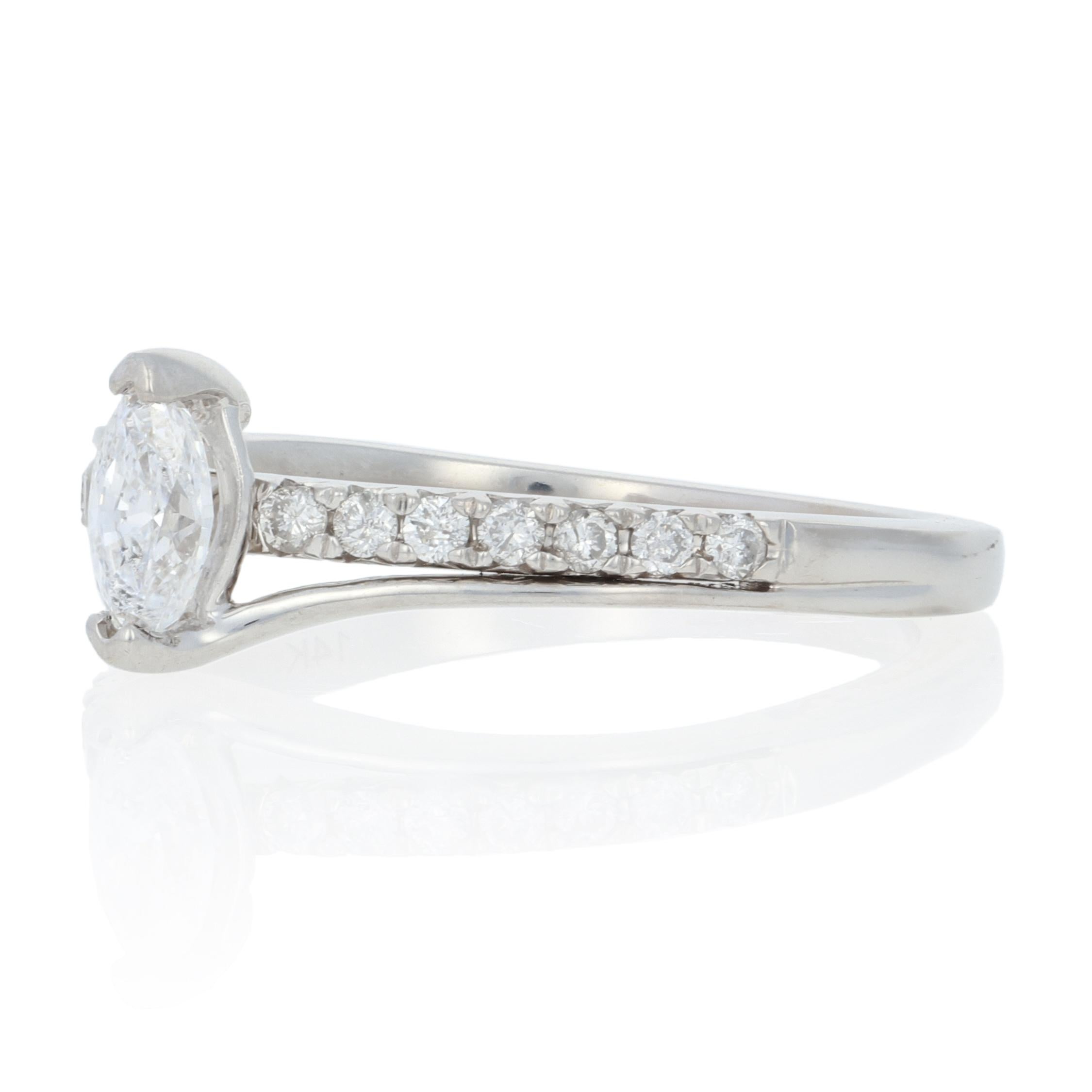 solitaire with side accents engagement ring