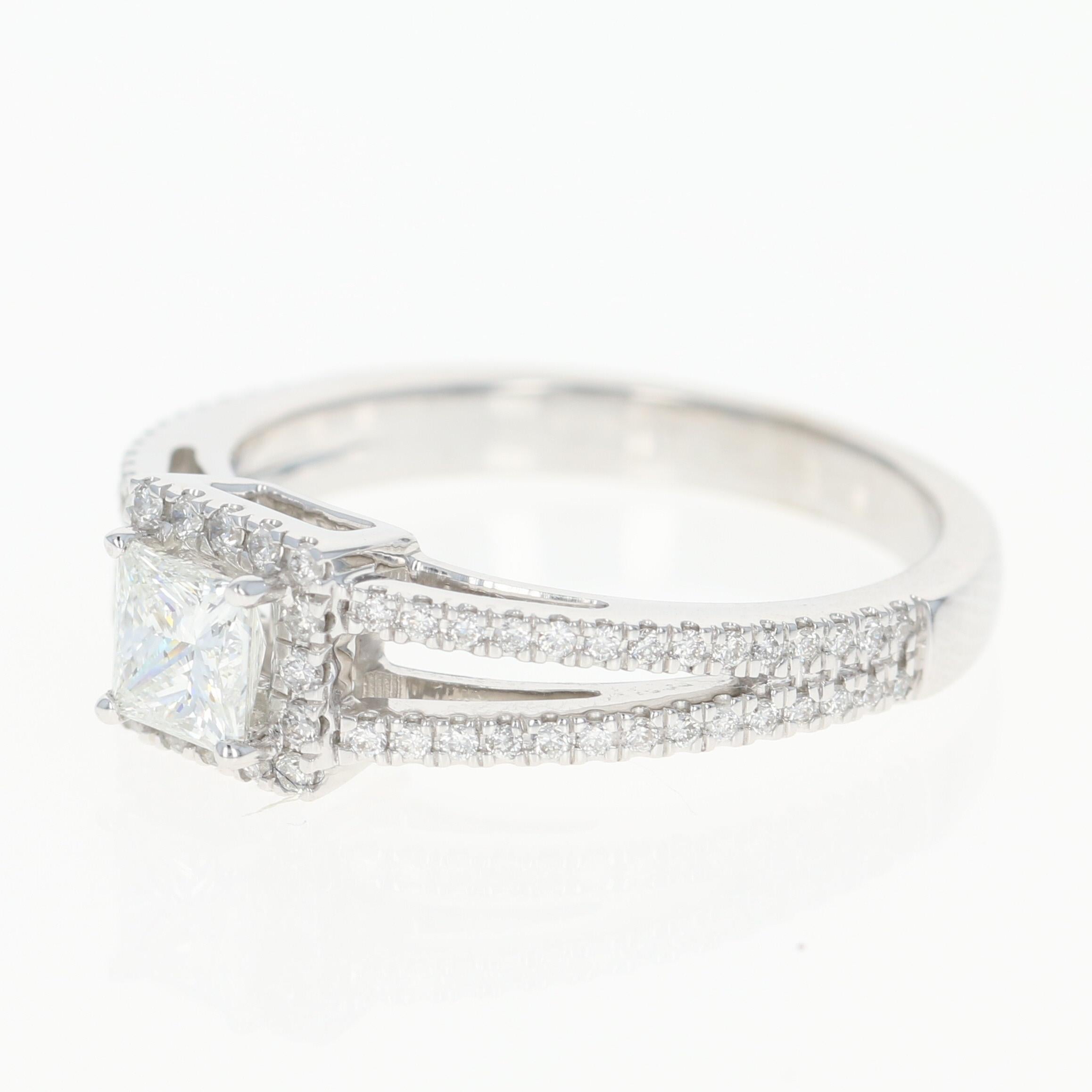 Put the sparkle into your special someone’s eyes when you propose with this exquisite engagement ring! Fashioned in popular 14k white gold, this NEW ring features a GIA-certified diamond solitaire framed in a halo of diamond accents. More accent