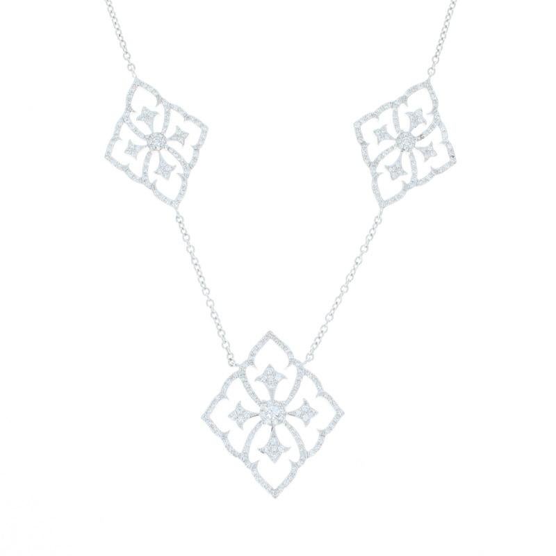 Give her the gift that says it all without saying a word! Exquisitely crafted in 18k white gold, this NEW cable chain necklace showcases a trio of ornate open cut pendants glittering with brilliantly sparkling diamonds.   

Metal Content: Guaranteed