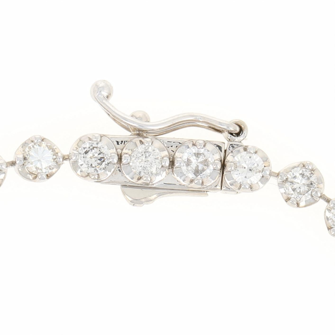 Some of the sweetest surprises sparkle! Fashioned in a classic tennis style, this sophisticated NEW bracelet showcases luminous diamonds set in glistening 14k white gold. 

Metal Content: Guaranteed 14k Gold as stamped

Stone Information:
Natural