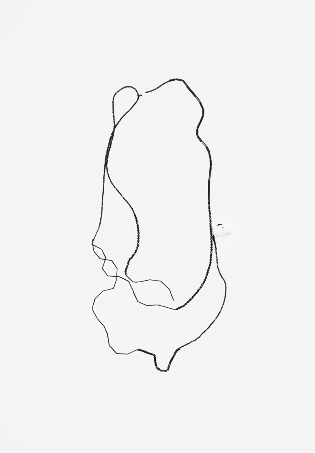 Check my other listings. Have many more designer clothes for sale. Open to any offers.
Item for sale is 100% genuine new Dior Homme SS04 “Strip” collection Beaded Necklace
Color: black
(An actual color may a bit vary due to individual computer