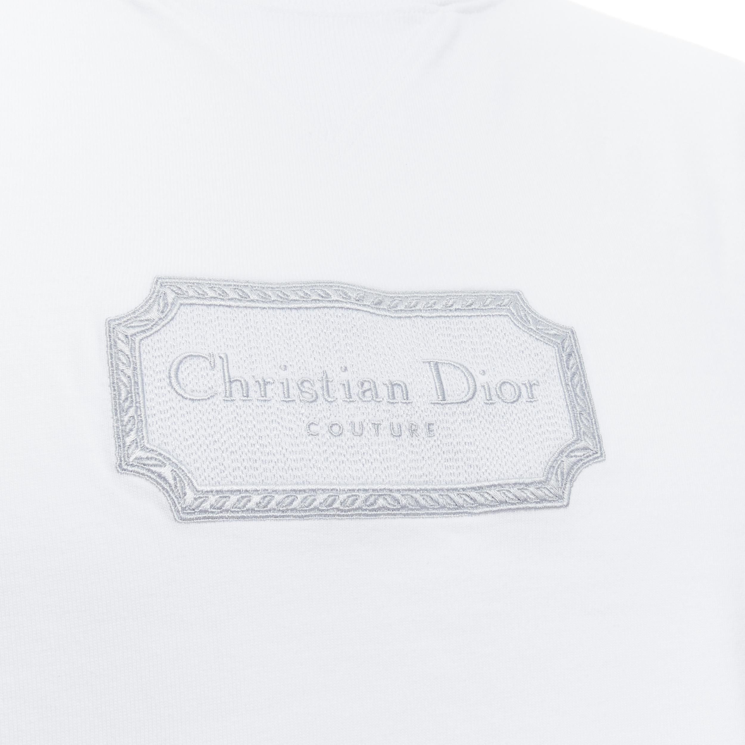 new DIOR MEN 2022 Runway Kim Jones Couture grey embroidery white boxy tshirt M 
Reference: JOMK/A00051 
Brand: Christian Dior 
Designer: Kim Jones 
Material: Cotton 
Color: White 
Pattern: Solid 
Extra Detail: Fall Winter 2022 logo tshirt gifted to