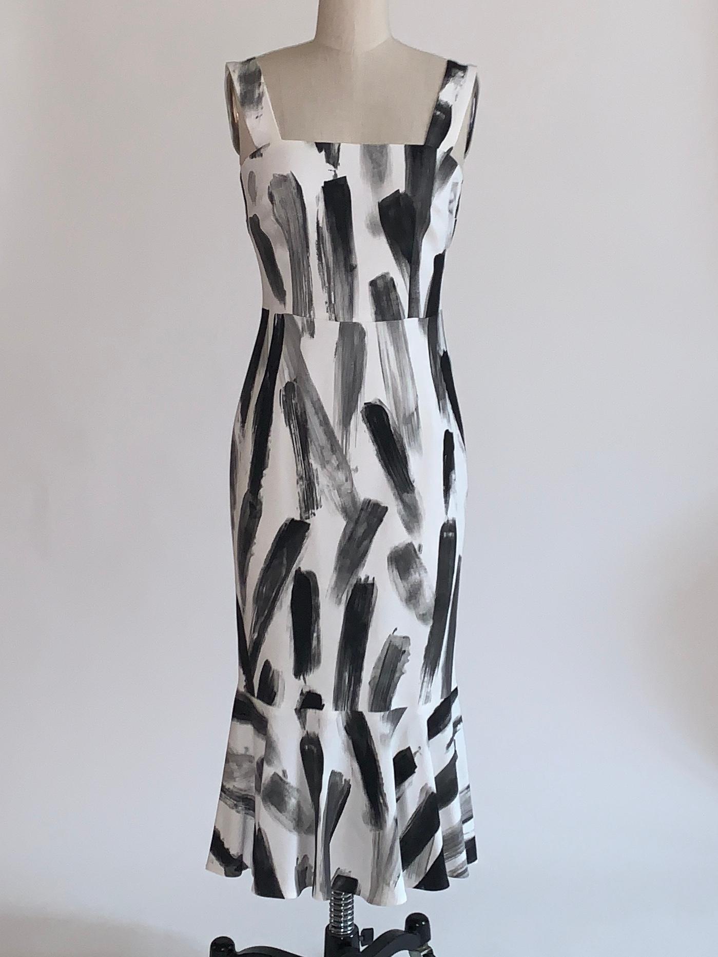 Dolce & Gabbana black and white brushstroke print sleeveless dress with flare hem as seen on the Spring 2016 runway, look 21. Back zip with hook and loop closure.

97% viscose, 3% elastane.
Fully lined in 96% silk, 4% elastane.

Made in Italy.

Size