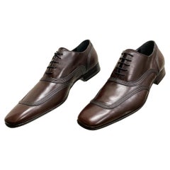 Chaussures neuves en cuir brossé marron à lacets Dolce & Gabbana, taille 43-10