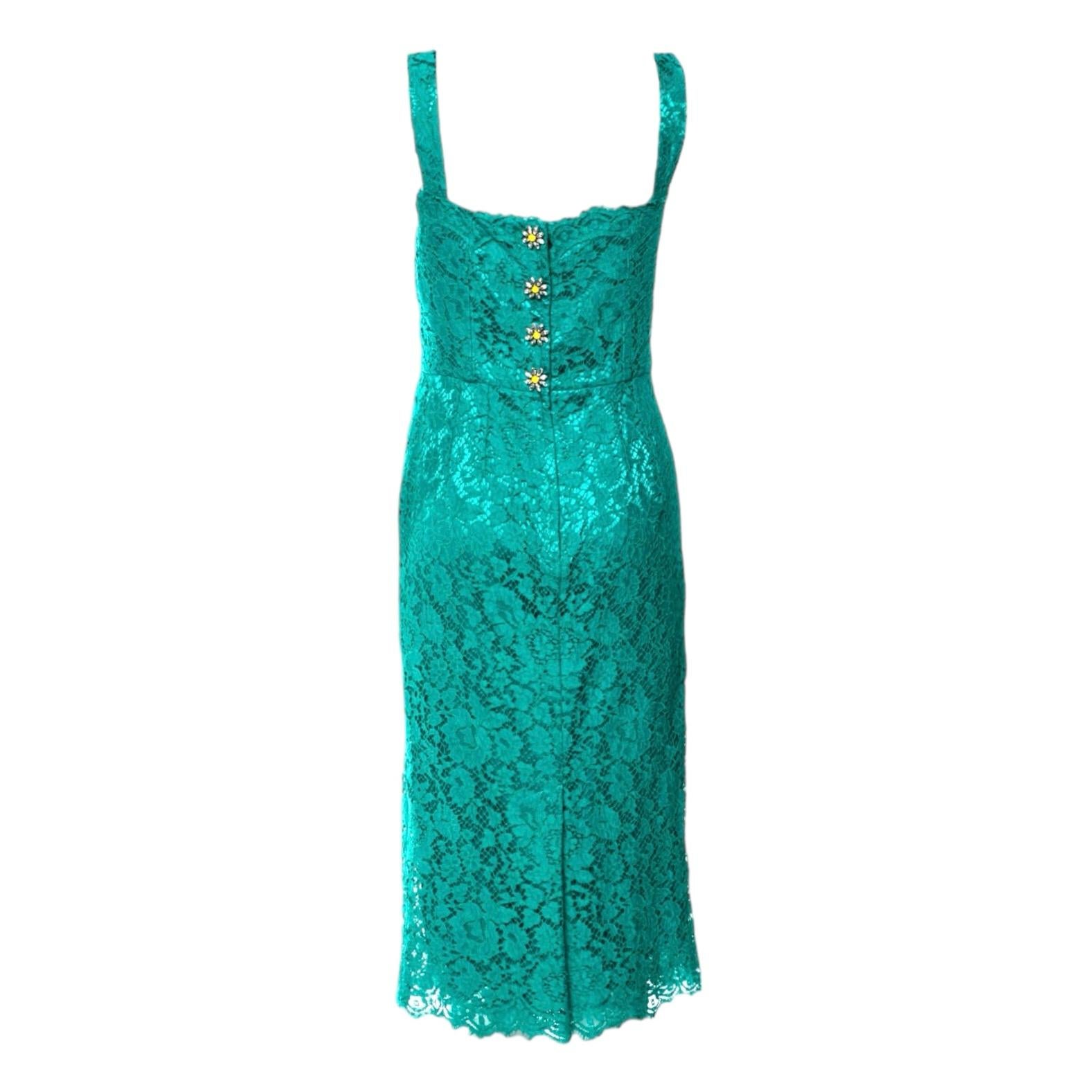 Beautifully cut from finest lace fabric, Dolce & Gabbana hit a retro-inspired note with this stunning shift dress
A DOLCE & GABBANA piece that will last you for years
Square neckline
Wide shoulder straps
4 Stunning crystal-encrusted floral buttons