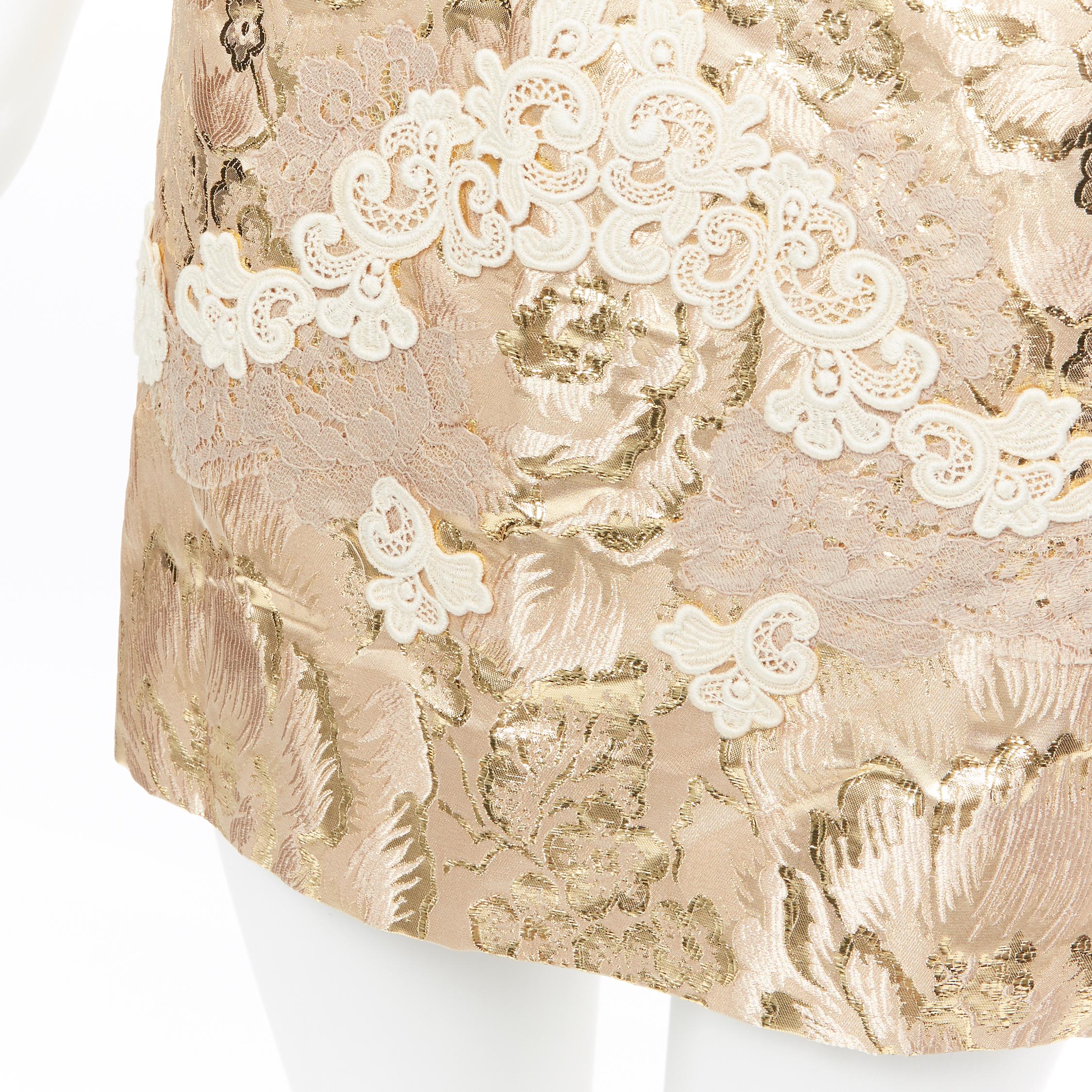 new DOLCE GABBANA metallic gold lace applique floral brocade fitted skirt IT36
Brand: Dolce Gabbana
Designer: Dolce Gabbana
Model Name / Style: Brocade skirt
Material: Polyester, silk
Color: Gold
Pattern: Floral
Closure: Zip
Lining material: