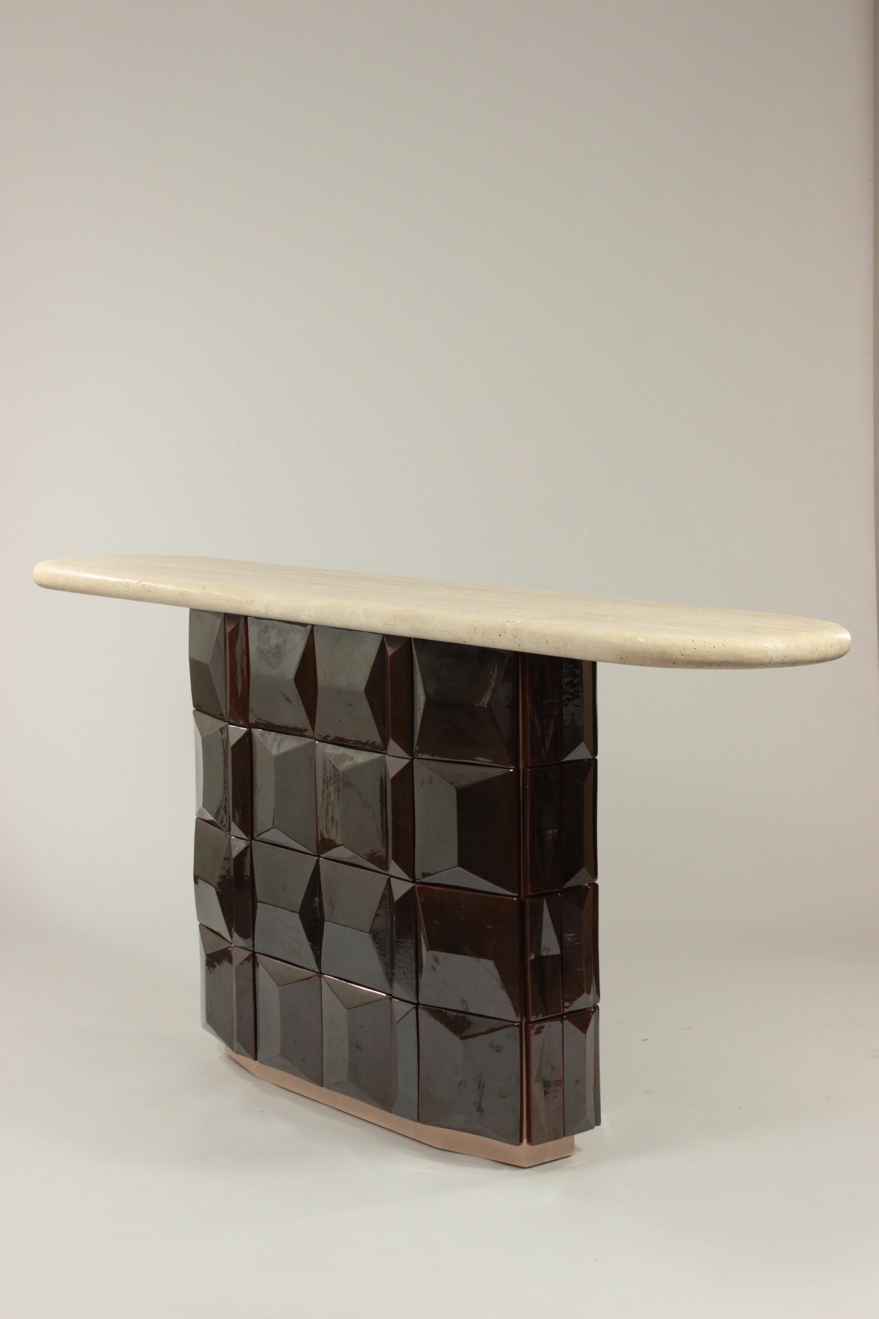 Born from a collaboration with Theia Tiles, the Milano Table celebrates the beauty of handcrafted design. This fully handmade piece features a hexagonal base clad in terracotta tiles arranged in a harmonious blend of three unique models. The