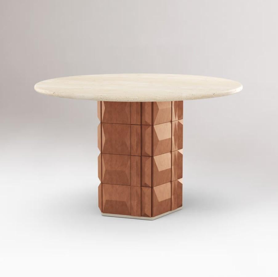 Born from a collaboration with Theia Tiles, the Milano Table celebrates the beauty of handcrafted design. This fully handmade piece features a hexagonal base clad in terracotta tiles arranged in a harmonious blend of three unique models. The