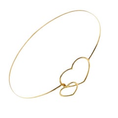 Nuevo Brazalete de Oro Doble Corazón con Lazo en Oro Amarillo de 18 ct