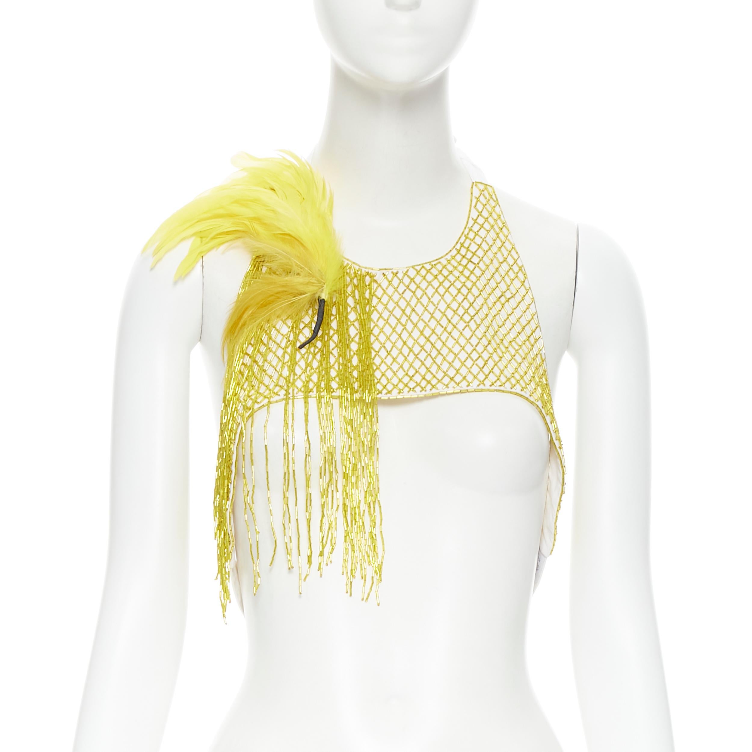 new DRIES VAN NOTEN 2019 runway yellow beaded feather harness top FR36 S 
Reference: TGAS/B00954 
Brand: Dries Van Noten 
Designer: Dries Van Noten 
Collection: Spring Summer 2019 Runway
Material: Cotton 
Color: Yellow 
Pattern: Solid 
Closure: