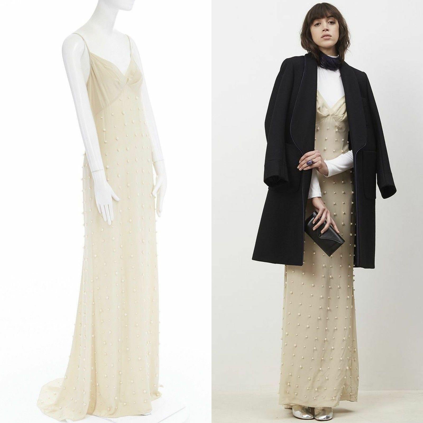 new DRIES VAN NOTEN AW16 Deming beige pearl embellished slip gown dress FR34 XS

DRIES VAN NOTEN
FROM THE FALL WINTER 2016 COLLECTION
Deming dress . 100% silk . Ecru beige . 
Faux pearl in various sizes embellished allover . 
Spaghetti strap .