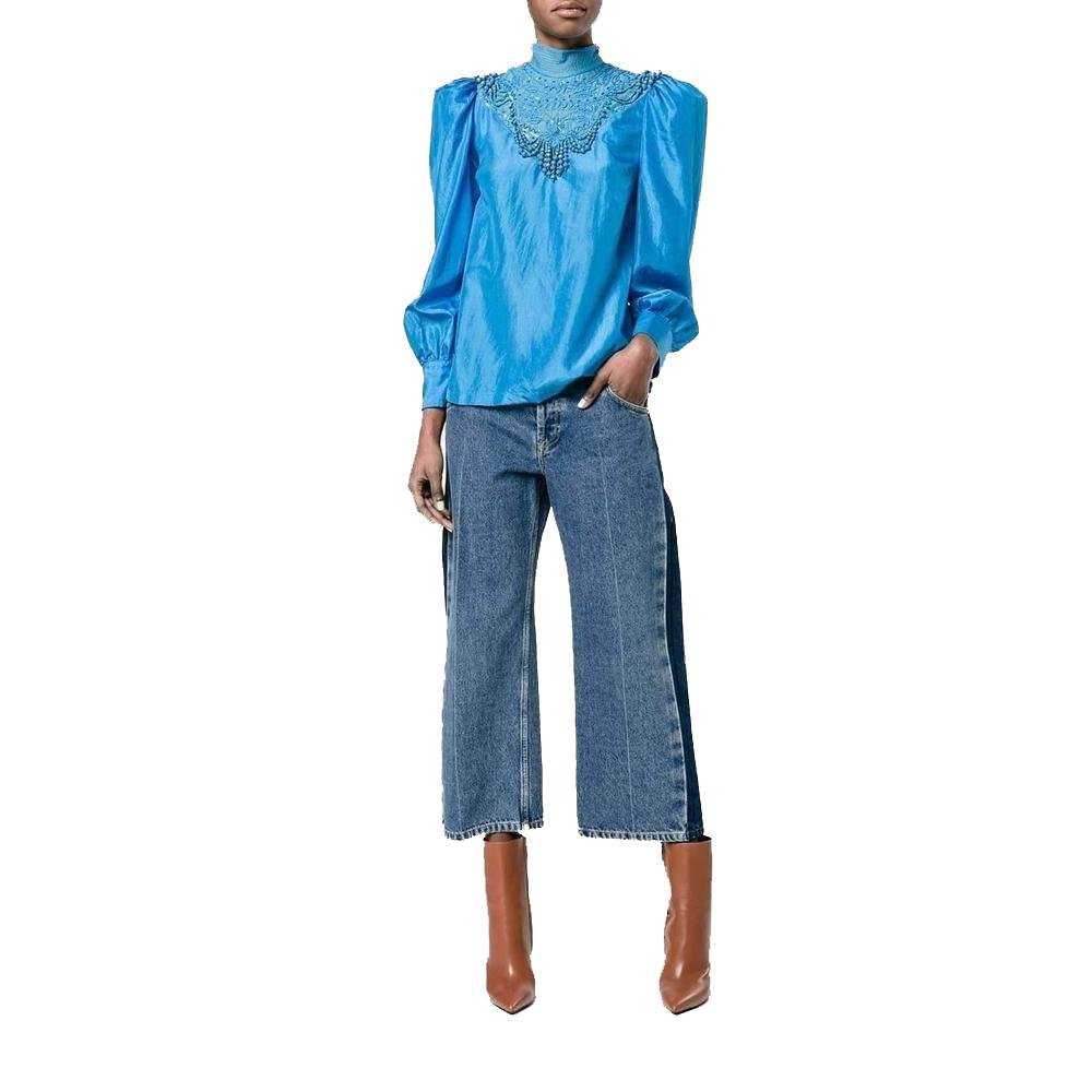 The Coxy embellished blouse from Dries Van Noten is crafted from pure silk.
Mock turtleneck.
Long sleeves with gathering details.
Barrel cuffs.
Hidden rear zip closure and sequin, beaded embellishment at the front and rear.
Color: blue.
Dry Clean