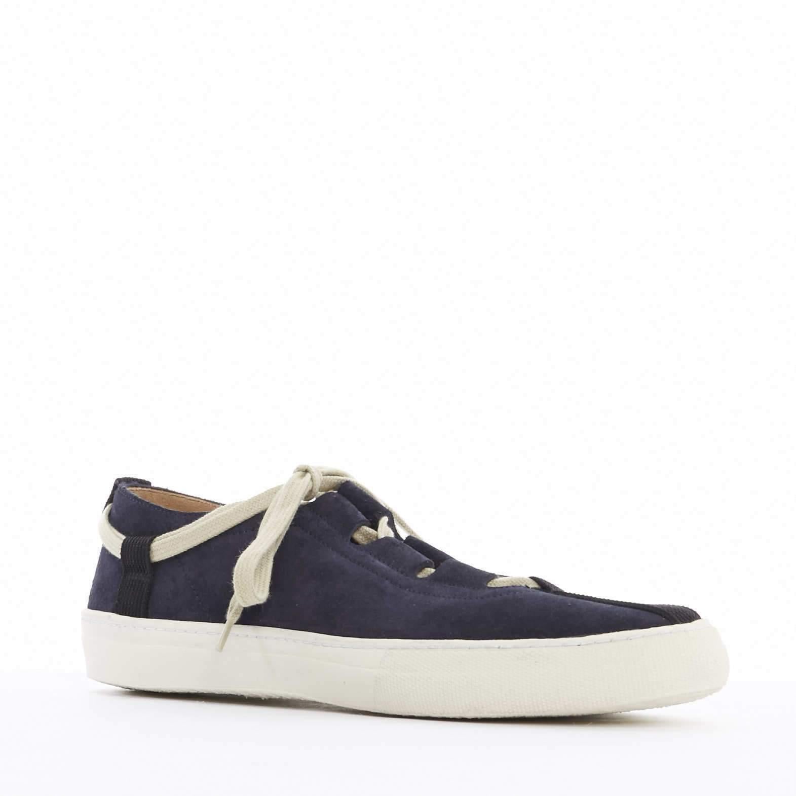 new DRIES VAN NOTEN navy blue suede cut out lace up skate sneakers shoes EU41

DRIES VAN NOTEN
Navy blue suede leather upper . Black looped grosgrain trimming at toe . Rounded toe . Cut out and lace up front . White rubber . 
Made in