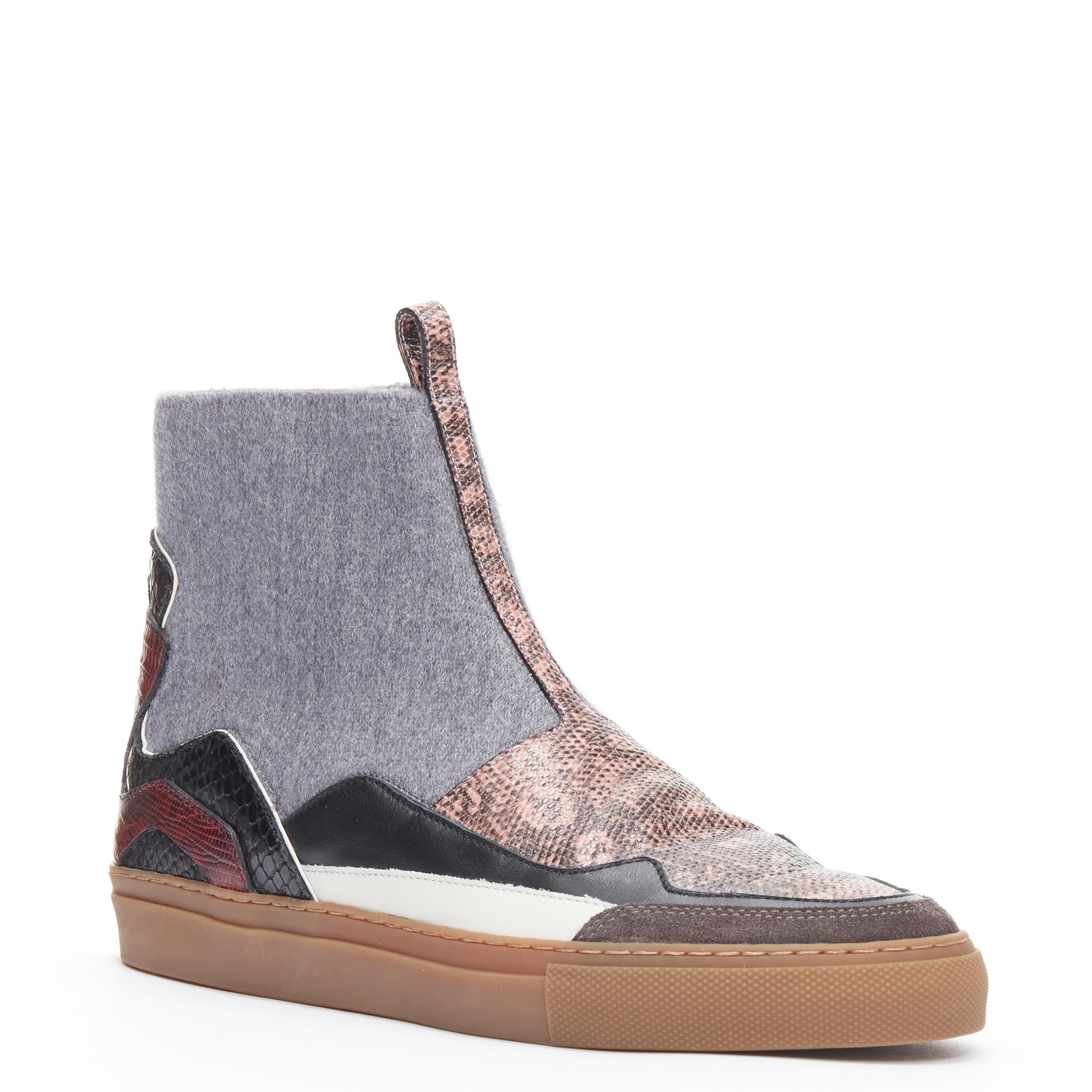 new DRIES VAN NOTEN pink black printed leather grey wool high top sneaker EU37 
Reference: CELG/A00231 
Brand: Dries Van Noten 
Designer: Dries Van Noten 
Material: Leather 
Color: Pink 
Closure: Stretch 
Extra Detail: Grey wool felt upper. Black