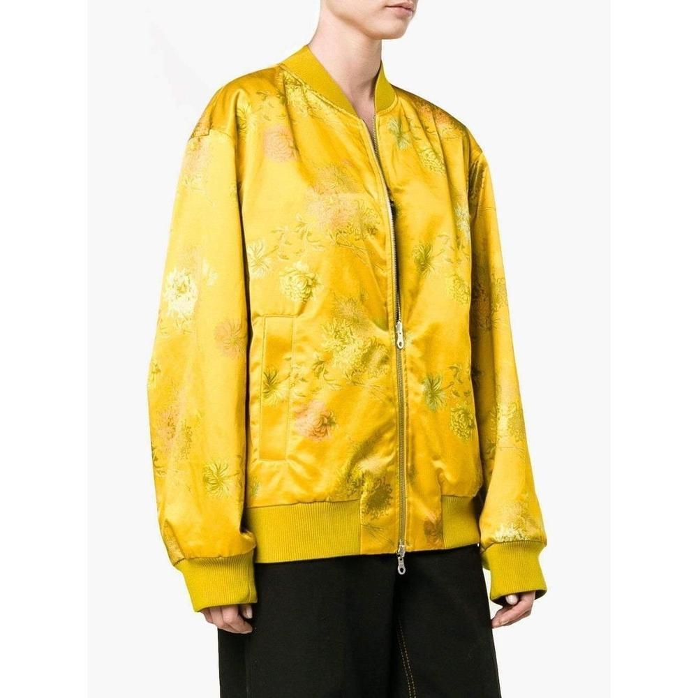 Reversible jacket from Dries Van Noten is rendered with lustrous
khaki green fabric.
Khaki green cotton-blend fabric with slight sheen.
Sunflower yellow with multi-colour Chinese floral print satin reverse.
Dropped shoulder.
Ribbed