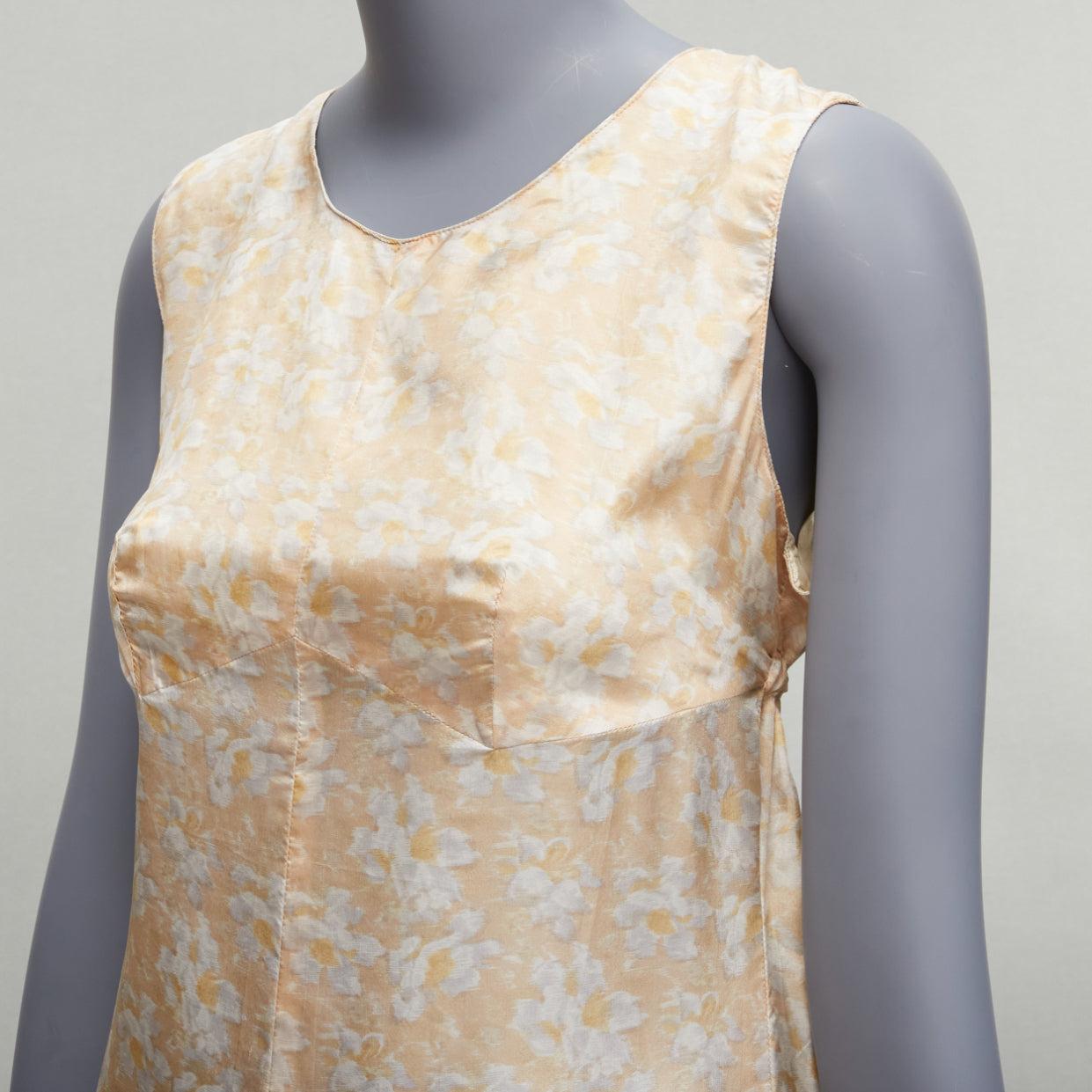 new DRIES VAN NOTEN Vintage 100% silk beige daisy print midi dress FR38 M
Reference: PYCN/A00100
Brand: Dries Van Noten
Material: Silk
Color: Beige
Pattern: Floral
Closure: Drawstring
Extra Details: Drawstring waistband adjustable.
Made in: