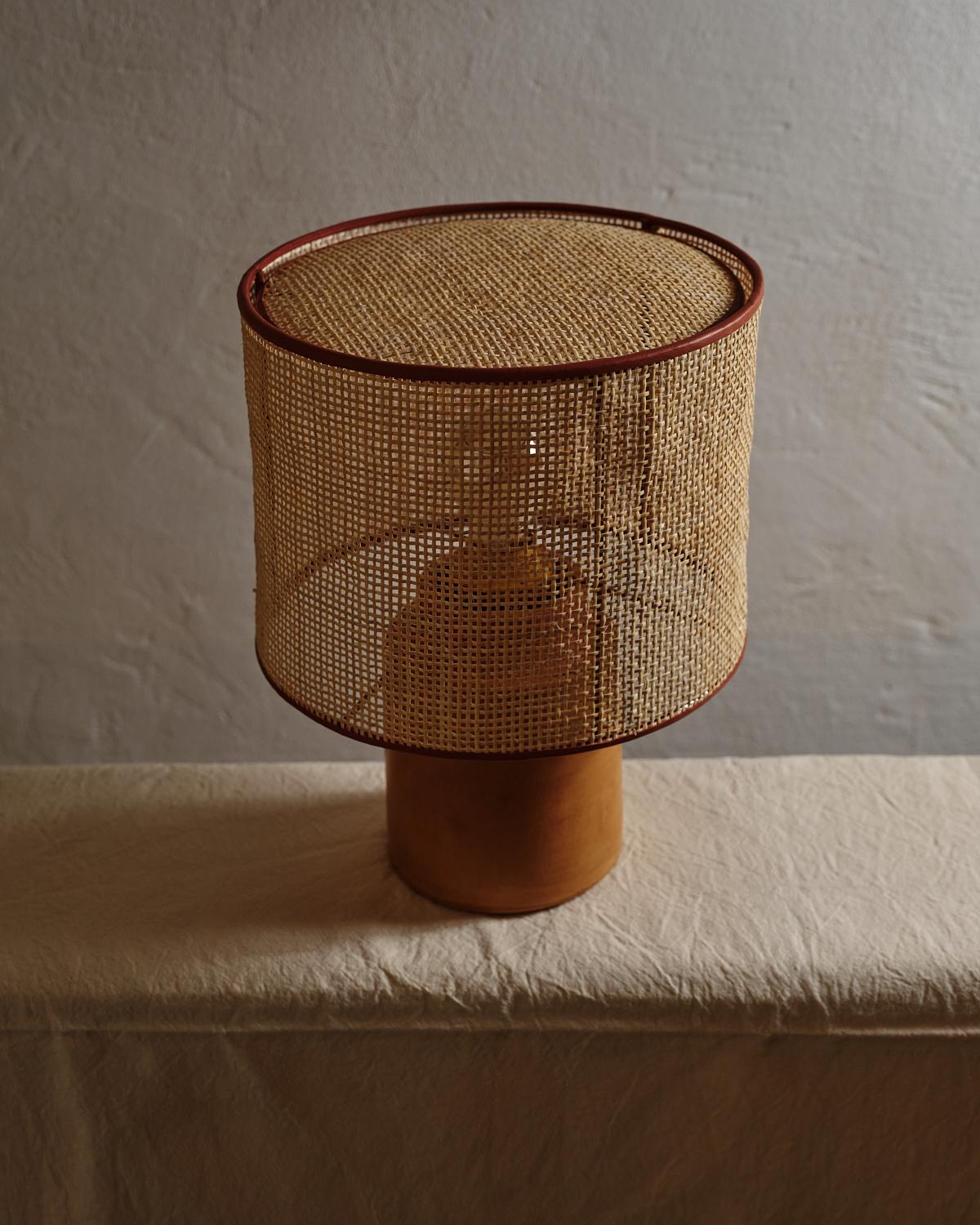 New Edition 2025 Medium Sonora Rattan Table Lamp by NASSI
Dimensions: W 30 x D 30 x H 45 cm. 
Materials: Lampshade: coated iron, Natural rattan, cotton trimmings
Base: wood-fired clay with beeswax finish.
Weight 2 kg

About: An established part of