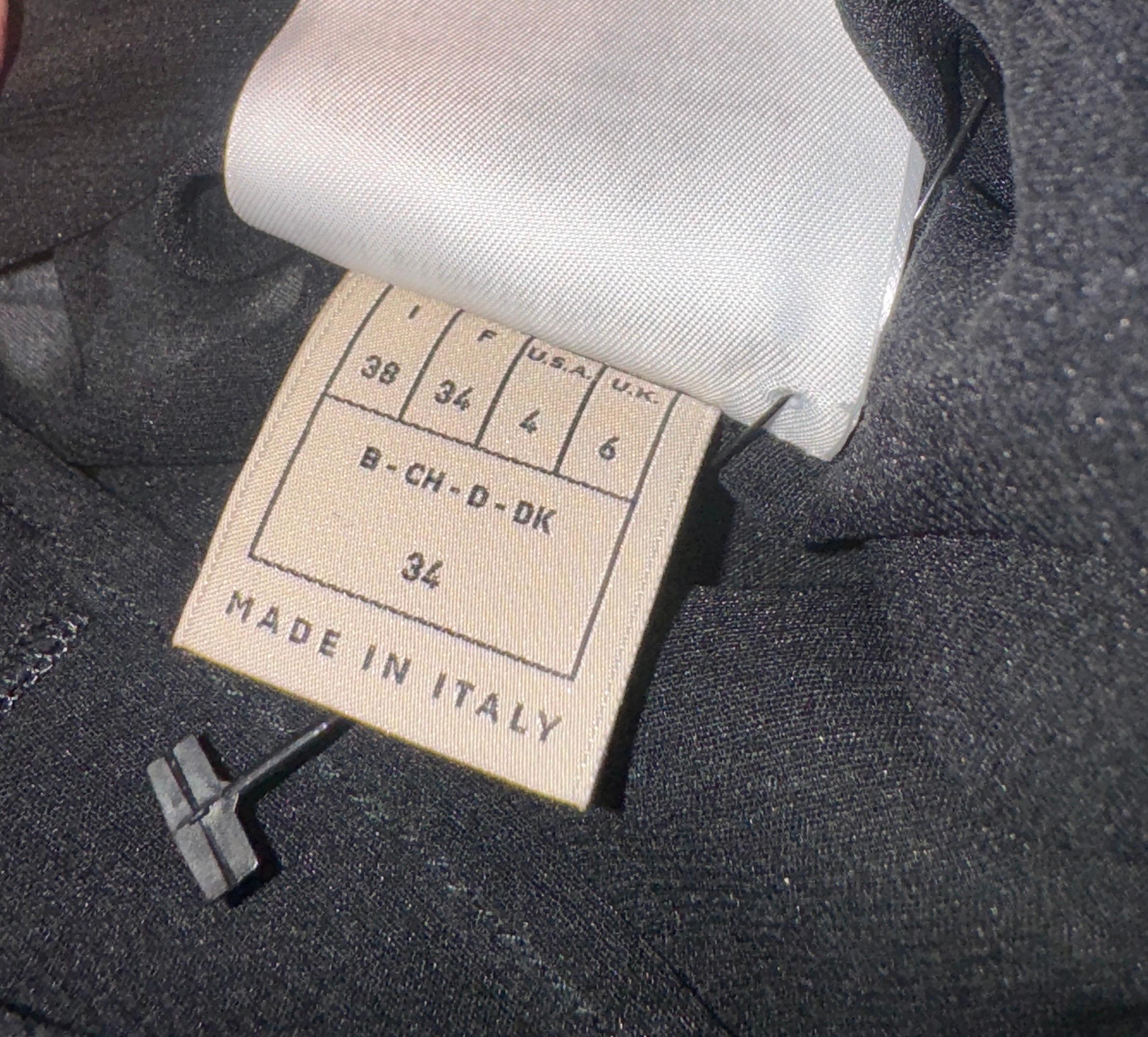 NEU Emilio Pucci Mehrfarbiges Tunikakleid mit Signaturdruck und Kettendetail mit Muster 38 im Angebot 4