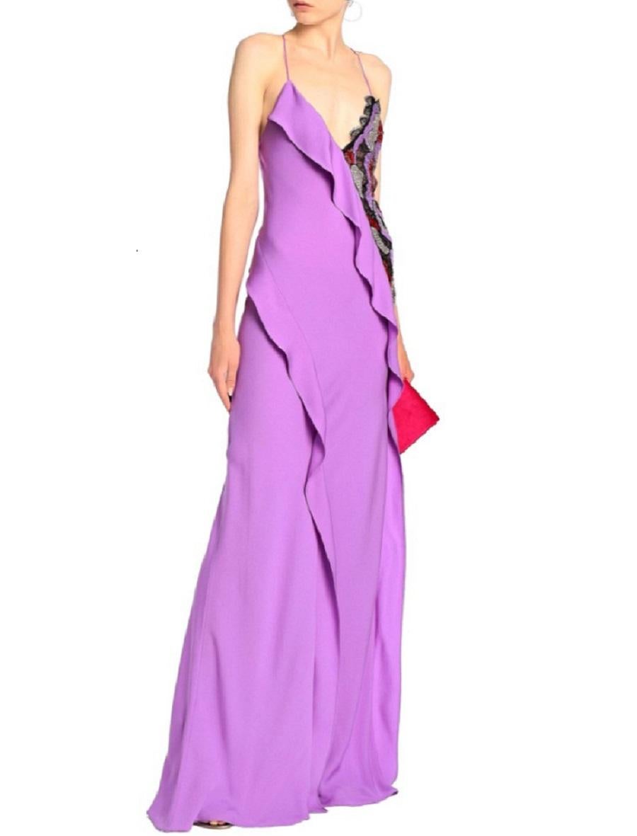 New Emilio Pucci Purple Embellished Long Silk Dress Gown
Italian size 38, US 4, Fr 34, UK 6.
100% Silk, Finished with Sequins and Beads, Ruffle Details, Open Back, Zip Closure.
Measurements approx: Length - 62 inches, Bust - 30/32