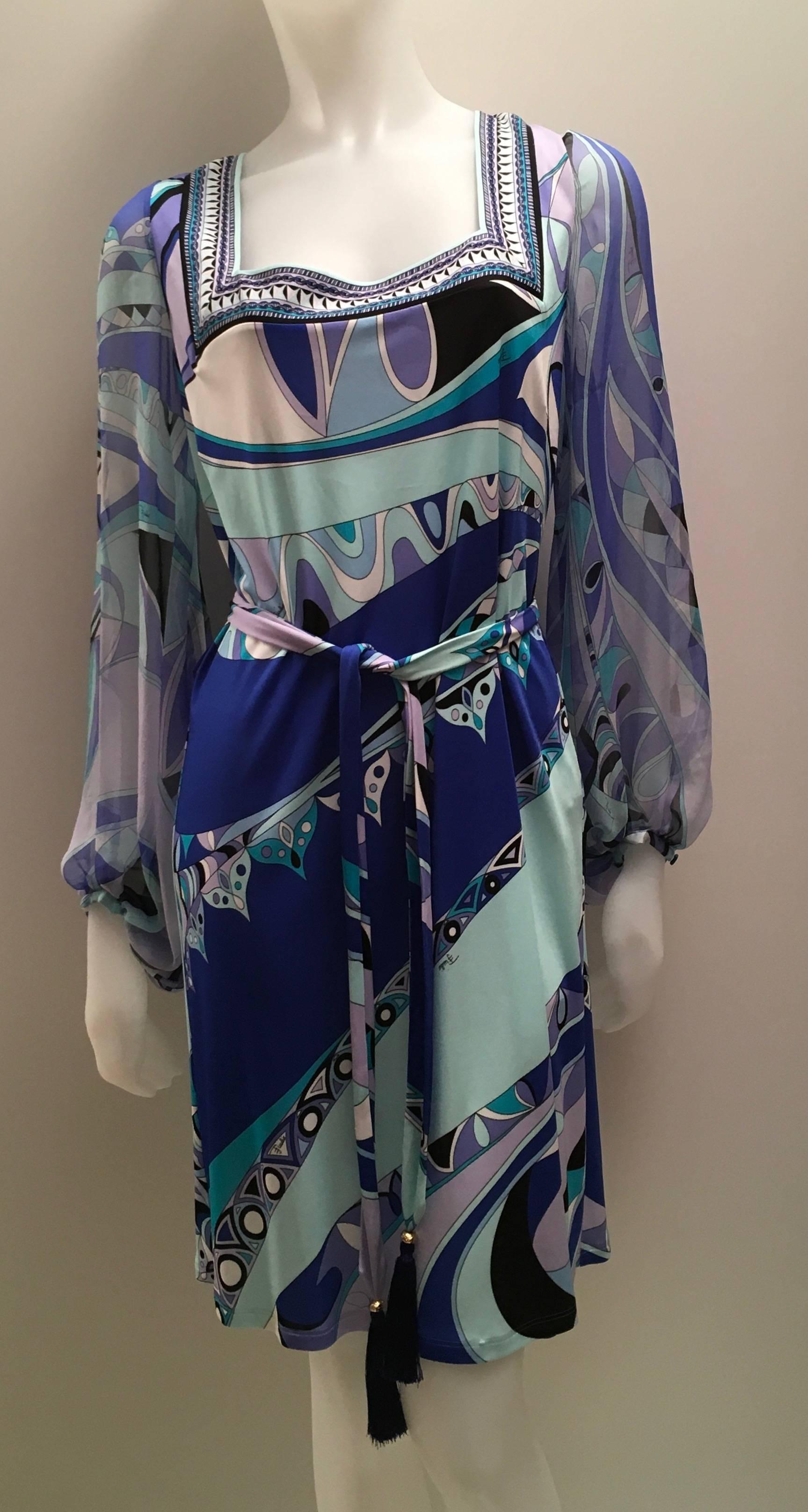 Emilio Pucci New Dress with belt 
Magnificent  Retail over $2000.00
Beautiful new Pucci dress with matching belt and Chiffon sleeves.
This beautiful dress is Pucci at its finest
The dress runs small and is meant to be worn loose
The measurements are