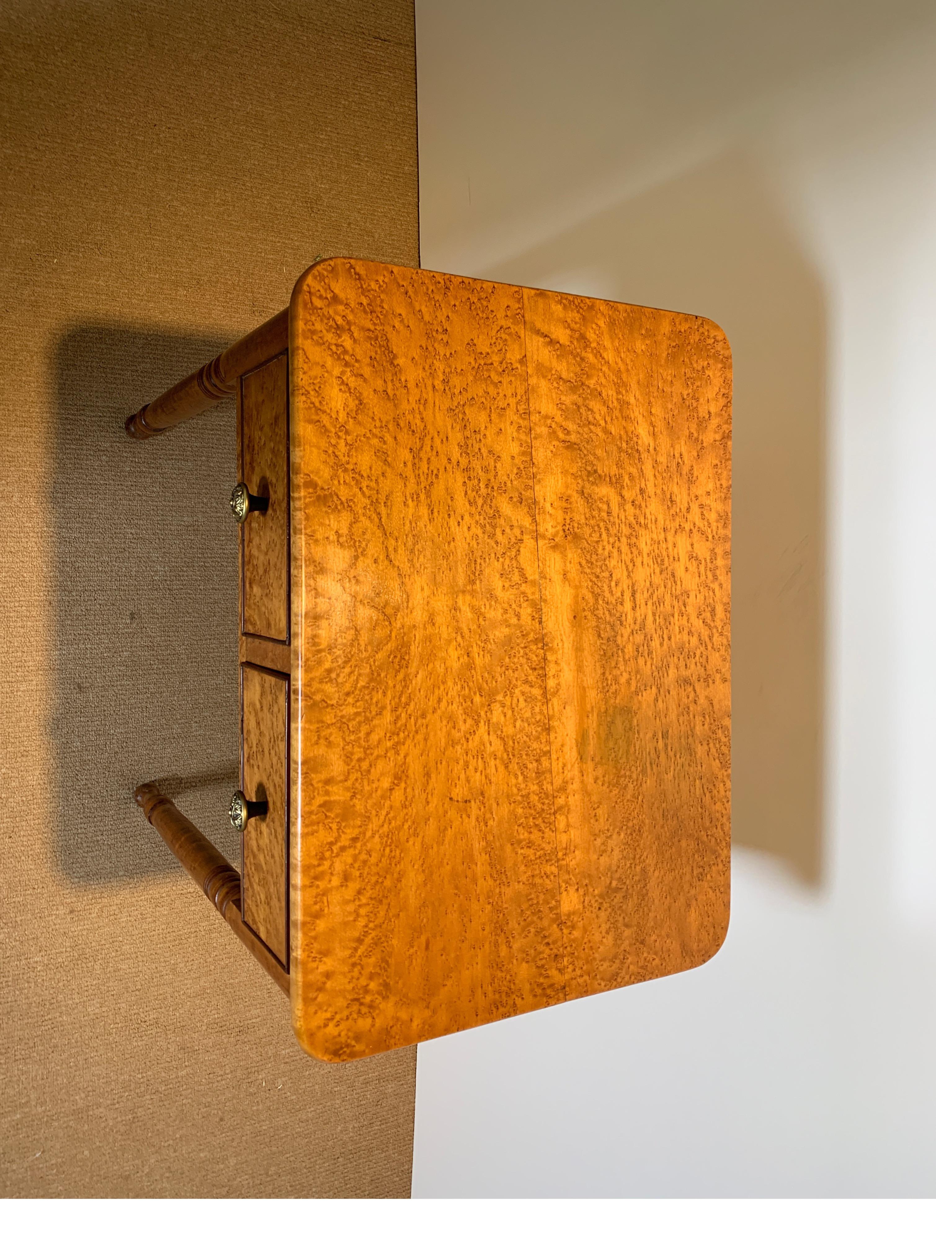 A diminutive and Fine Sheraton bird's-eye maple two drawer work Stand the drawers with a divided mahogany beaded drawers above slender turned legs. Recent French Polish.