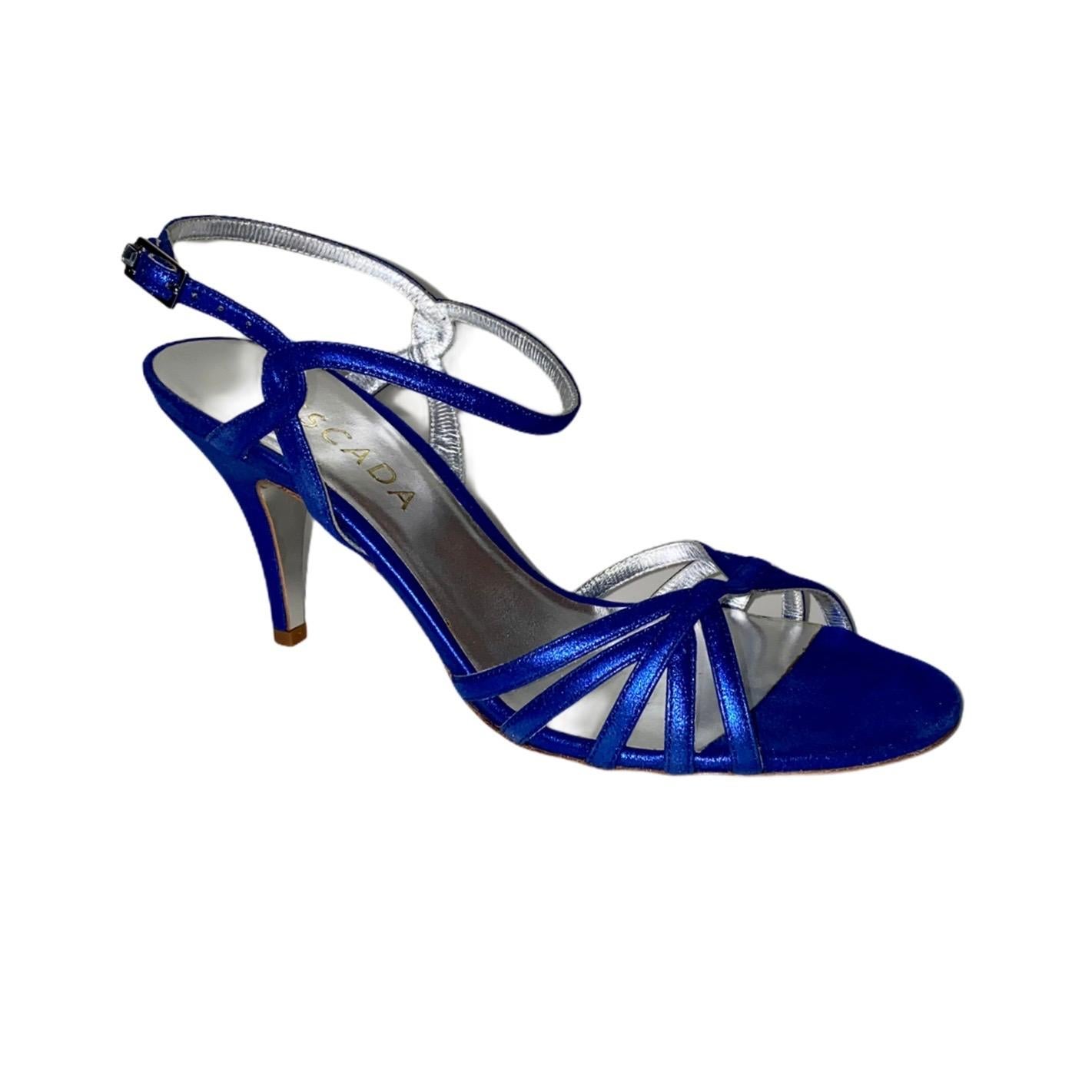 GORGEOUS ESCADA HIGH HEEL SANDALS

ESCADA signature piece that will last you for years
Blue metallic leather
Swarovski crystal closure at ankle
Size 38
Made in Italy
Brandnew and unworn
Retails for 699$ plus taxes