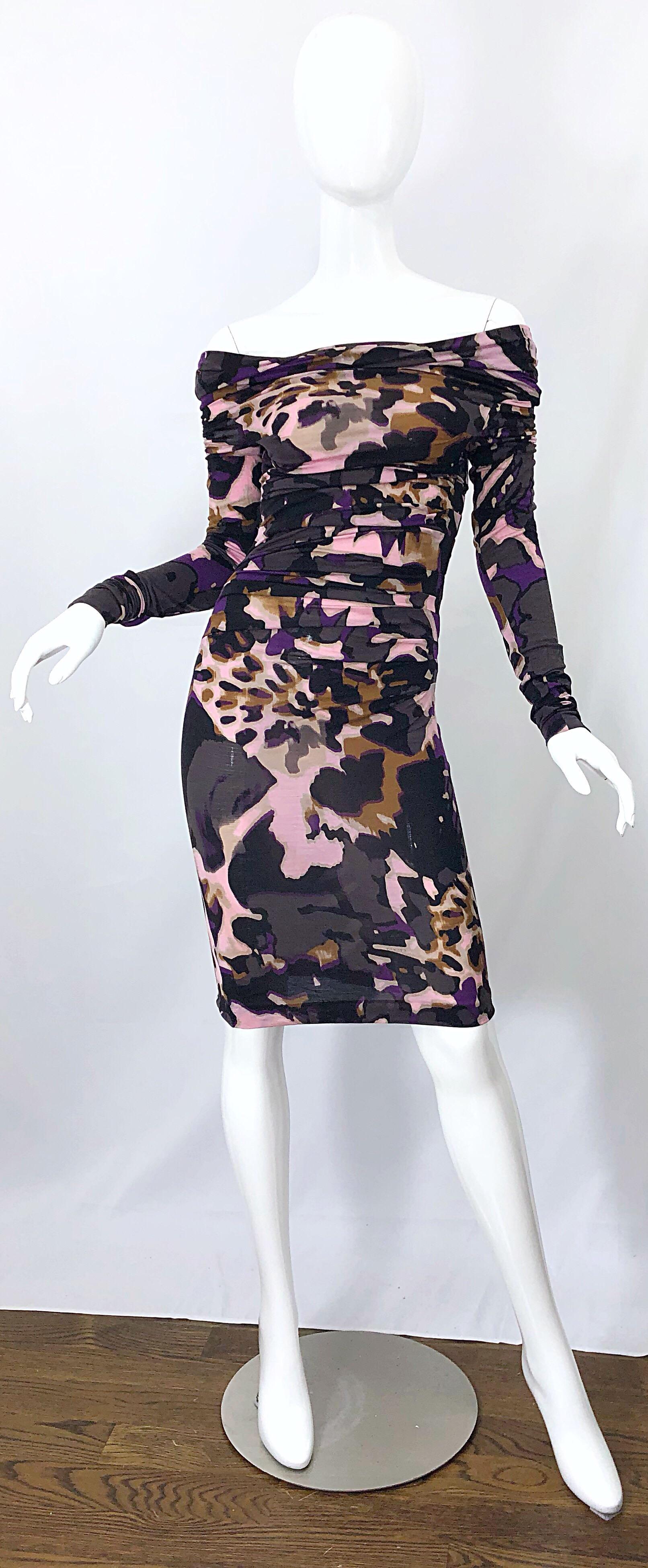 Incredible new ESCADA lightweight wool off-the-shoulder mixed animal print dress! Vibrant colors of purple, pink, gray, brown, rust and black throughout. Flattering ruching disguises any problem areas. The perfect lightweight fabric blends of wool