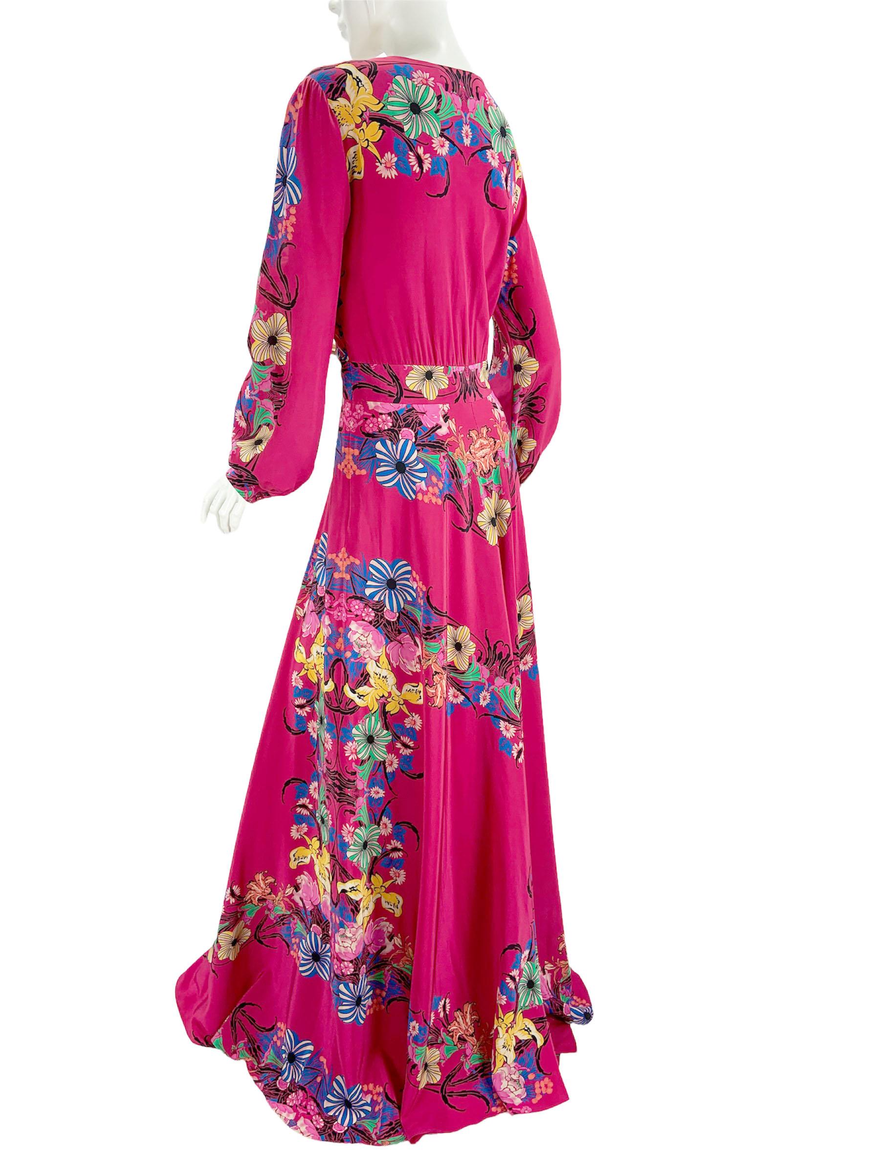 New Etro Silk Floral Print Maxi Dress
Italian size - 42 ( please check measurements ).
100% Silk, Fuchsia Background with Multiple Print of Colorful Flowers - Yellow, Orange, Blue, Green, Pink and White.
V-Neck Plunge, Ruched Top, Button Closure