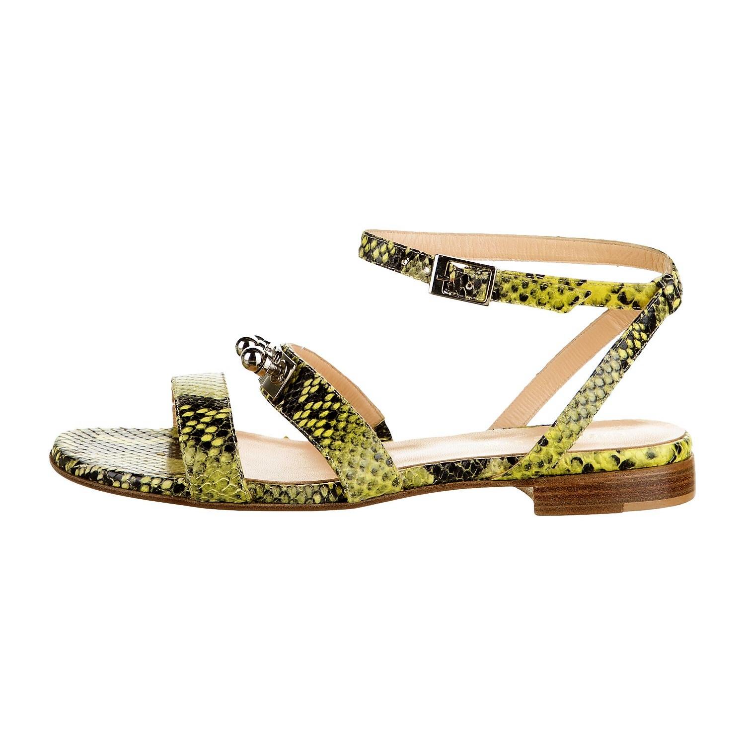 Eugenia Kim
$975
* Yellow & Black Genuine Python
Metal Accent
Adjustable Ankle Strap
* Eugenia Kim did a limited collection of stunning shoes, 
we were lucky to get a few pair!
* Size: 39 (these run a half size small, so a U.S. 8.5)
* Flats
Heels: