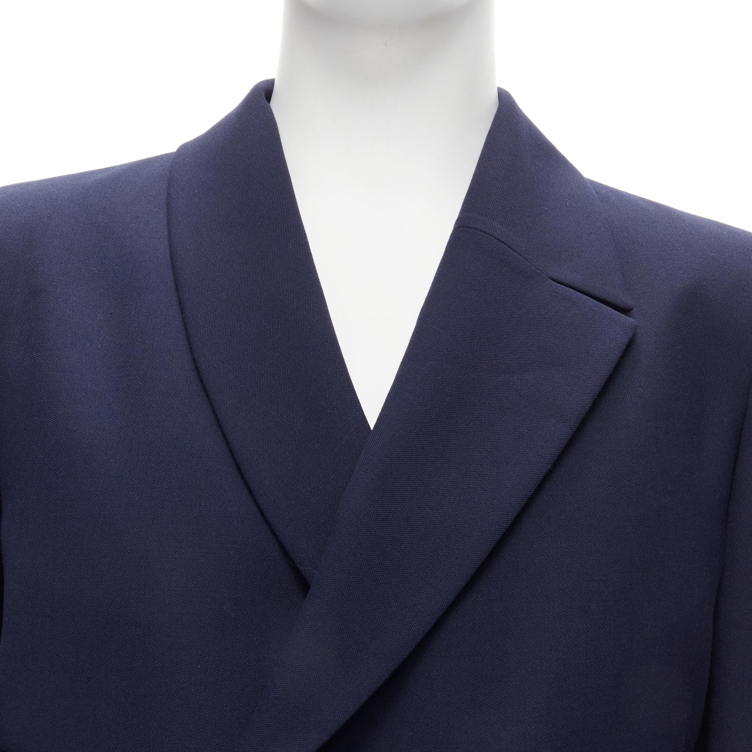 new FENDI 2019 Runway navy asymmetric double breasted cropped blazer IT48 M
Reference: CNLE/A00187
Brand: Fendi
Designer: Kim Jones
Collection: 2019 - Runway
Material: Polyester, Virgin Wool
Color: Navy
Pattern: Solid
Closure: Button
Extra Details: