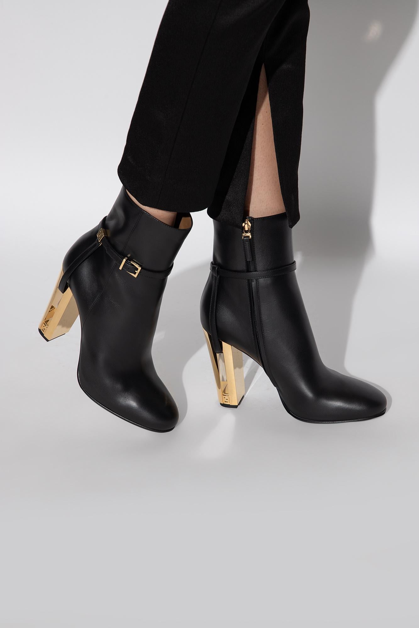 Fendi 
2023
Brand New With Box

Size 40 

Black Calf Leather
Gold Fendi FF Hardware
Concealed Zip Closure at Sides
Wrap-Around Adjustable Strap
Leather Insole
Heels: 4.5