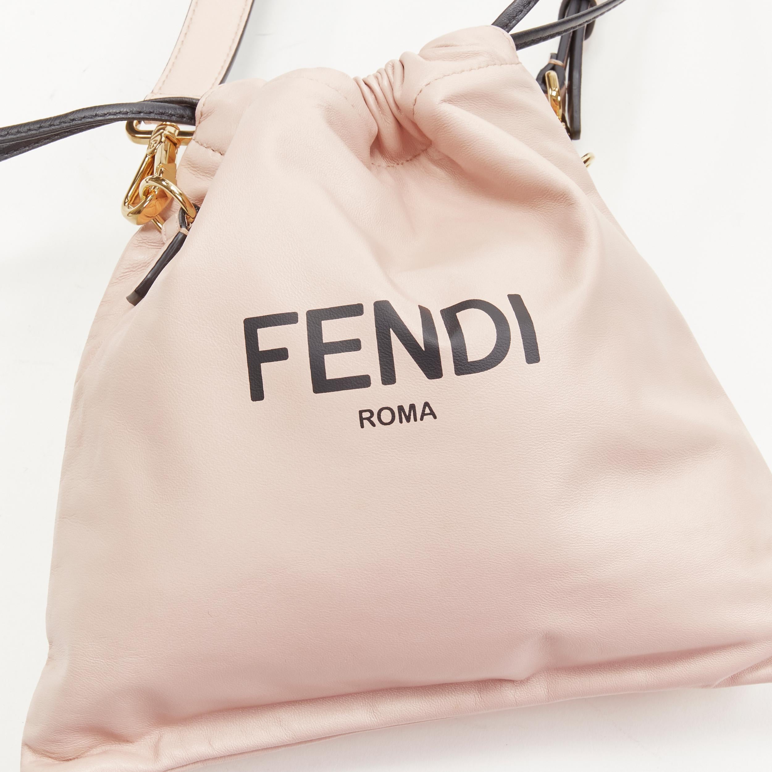 new FENDI beige pink logo print leather drawstring pouch crossbody bag In New Condition In Hong Kong, NT