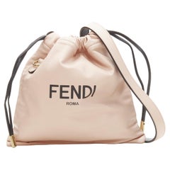 new FENDI beige pink logo print leather drawstring pouch crossbody bag