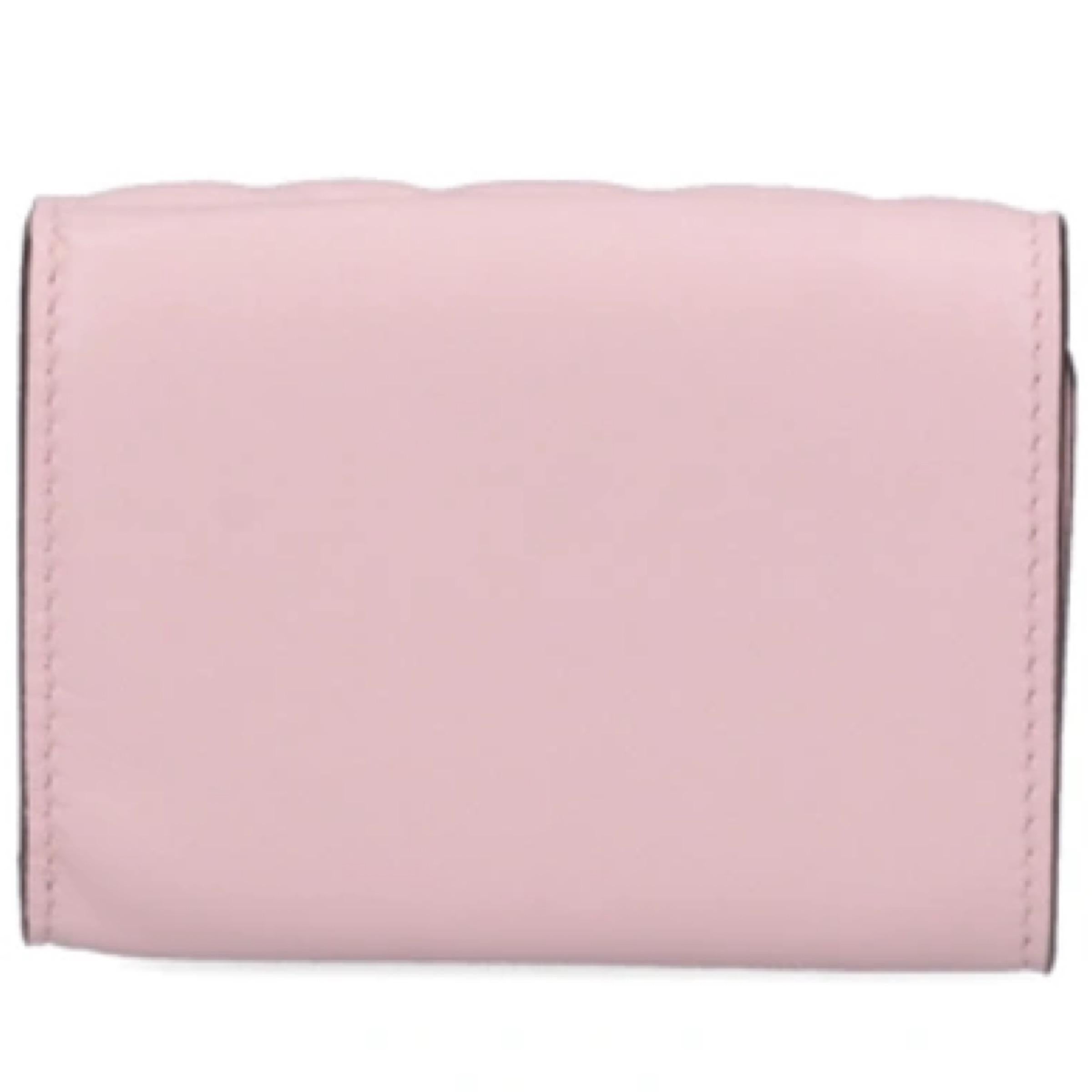New Fendi Candy Pink Baguette Micro FF Monogram Leather Trifold Wallet

Authenticity Guaranteed

DETAILS
Brand: Fendi
Condition: Brand new
Gender: Women
Category: Wallet
Color: Candy pink
Material: Leather
Front logo plaque
Monogram FF
Gold-tone