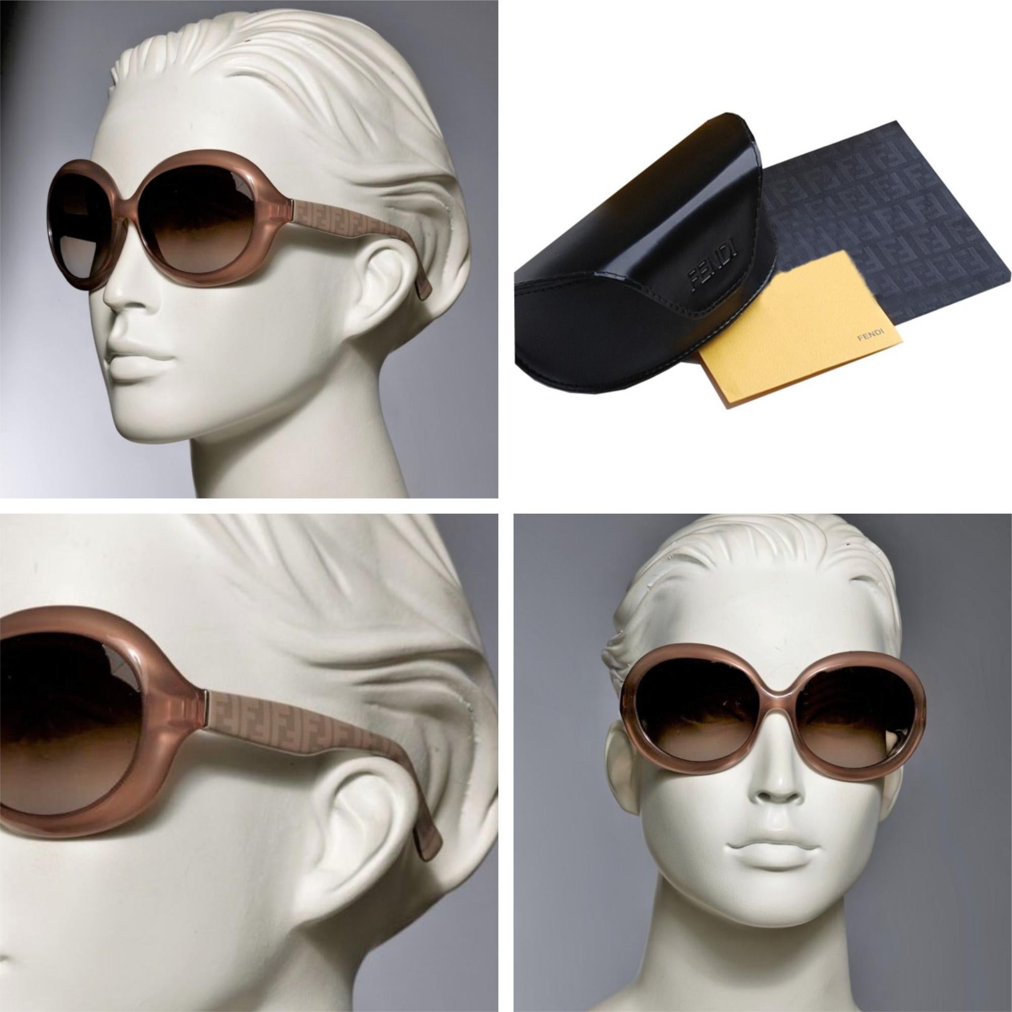 New Fendi Champagne Sunglasses with Case

Brand New
Fendi FF Logo at Sides
Beautiful Champagne Frames
60-16-125
Lightweight Scratch and Impact Resistant
Made in Italy
100% UVA/UVB Protection
With Case & Cleaning Clothing